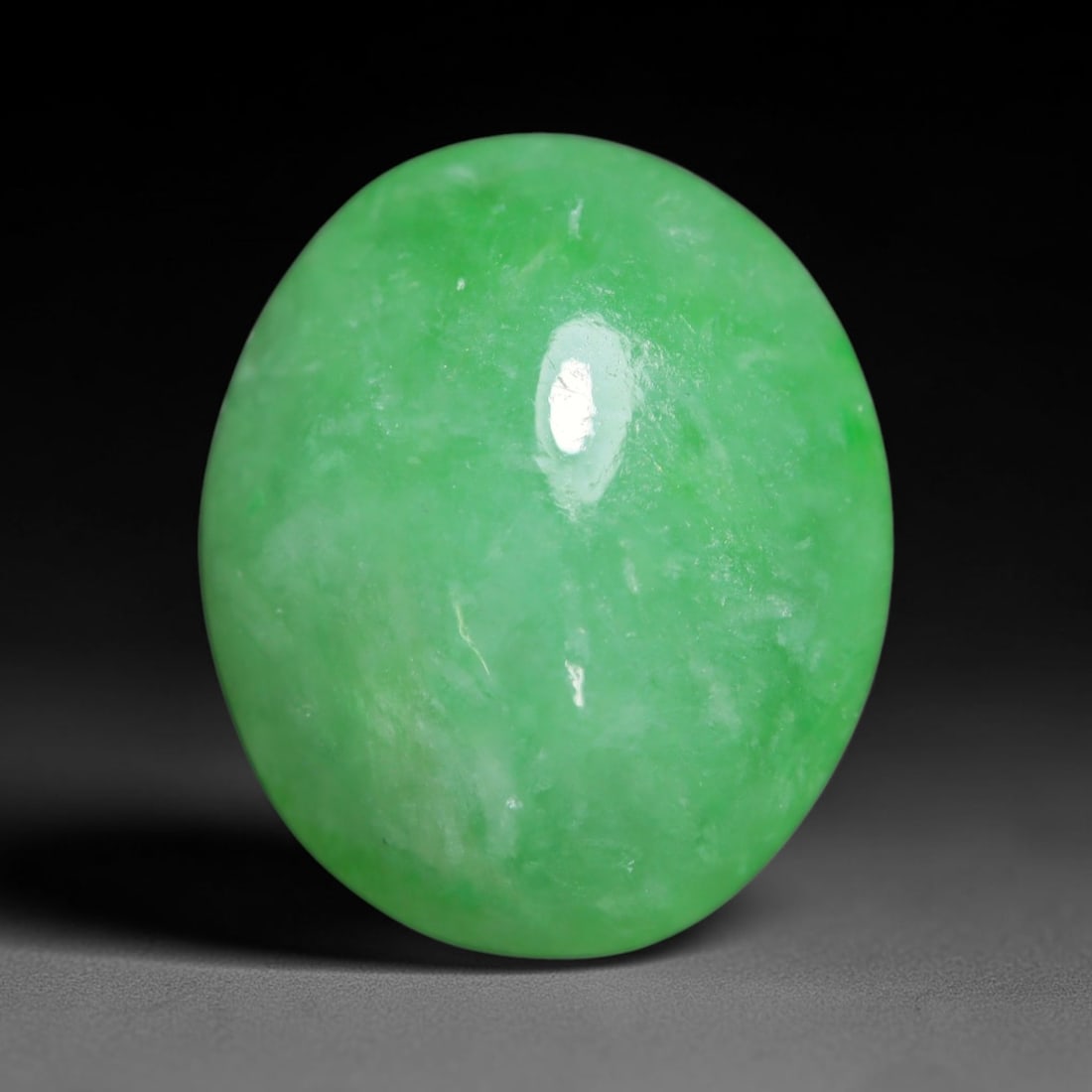 4.16ct Natural Burmese Type A Jadeite Jade Cabochon Loose Gemstone, 42BT: This smoothly polished cabochon is genuine Type A Burmese jadeite jade. It displays soft, even green saturation with gentle natural tonal variation across the polished surface, featuring a fine compac
