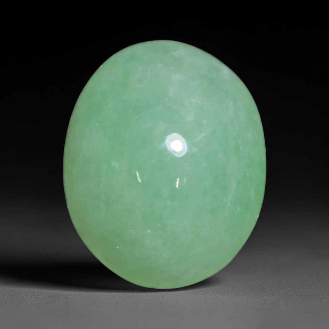 3.59ct Natural Burmese Type A Jadeite Jade Cabochon Loose Gemstone, 52BT: This smoothly polished cabochon is genuine Type A Burmese jadeite jade. It displays soft, even green saturation with gentle natural tonal variation across the polished surface, featuring a fine compac