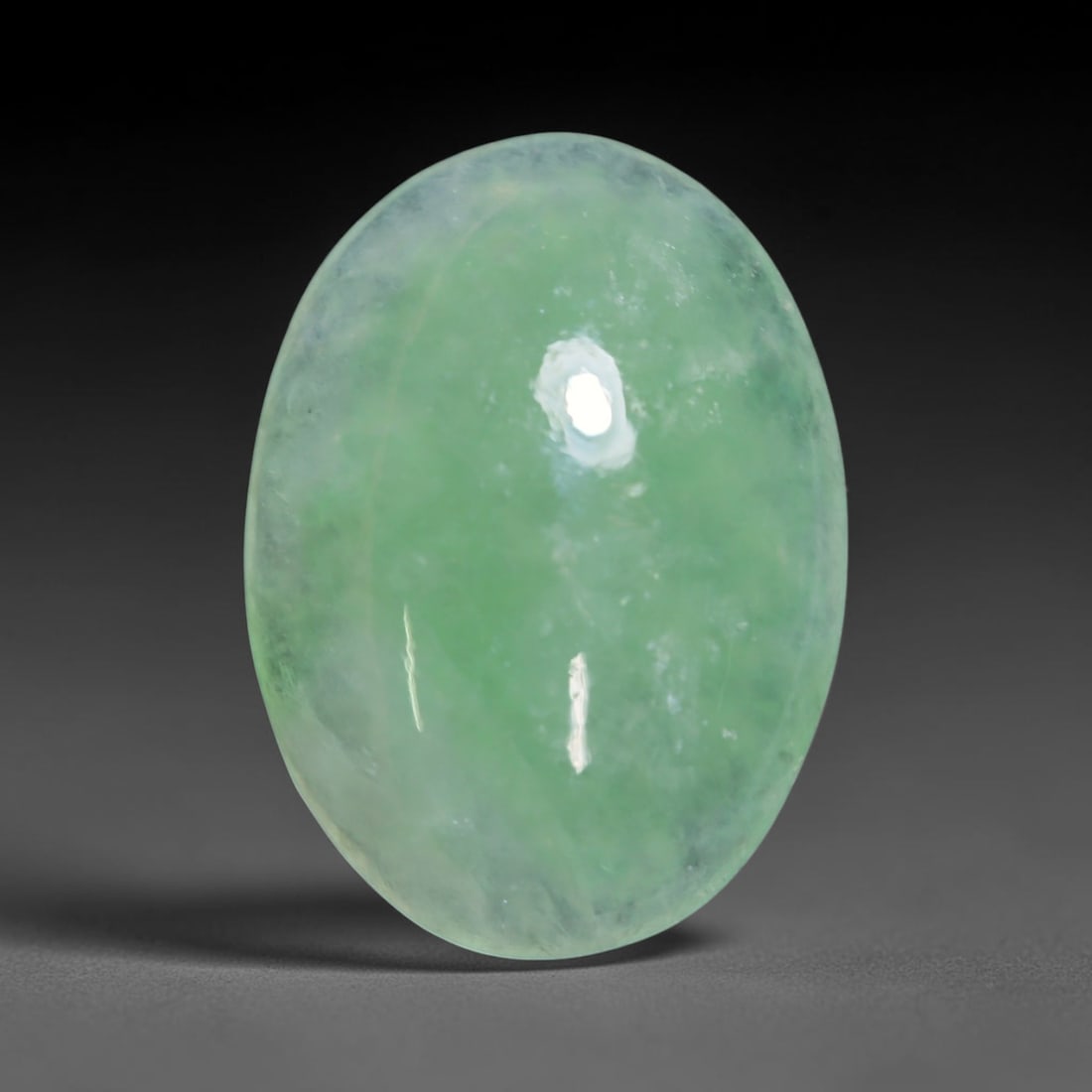 3.12ct Natural Burmese Type A Jadeite Jade Cabochon Loose Gemstone, 48BT: This smoothly polished cabochon is genuine Type A Burmese jadeite jade. It displays soft, even green saturation with gentle natural tonal variation across the polished surface, featuring a fine compac