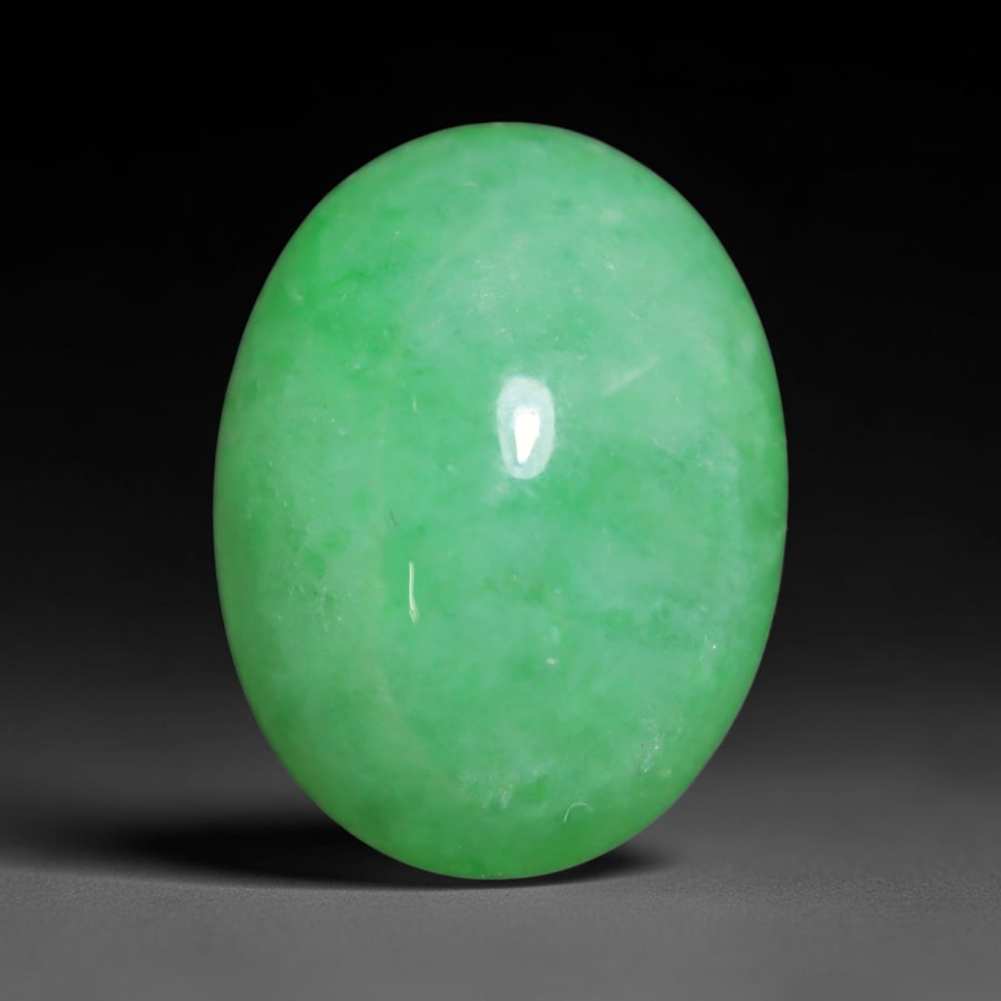 4.19ct Natural Burmese Type A Jadeite Jade Cabochon Loose Gemstone, 53BT: This smoothly polished cabochon is genuine Type A Burmese jadeite jade. It displays soft, even green saturation with gentle natural tonal variation across the polished surface, featuring a fine compac