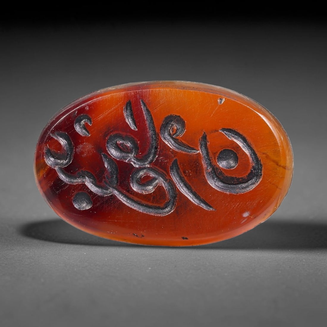 Vintage Mid-Century Carnelian Agate Islamic Calligraphic Intaglio Seal Cabochon Talisman, 49BW: This vintage mid-century natural carnelian agate intaglio seal cabochon draws inspiration from historic Islamic lapidary traditions, crafted as a wearable talisman and seal blank for jewelry setting. 