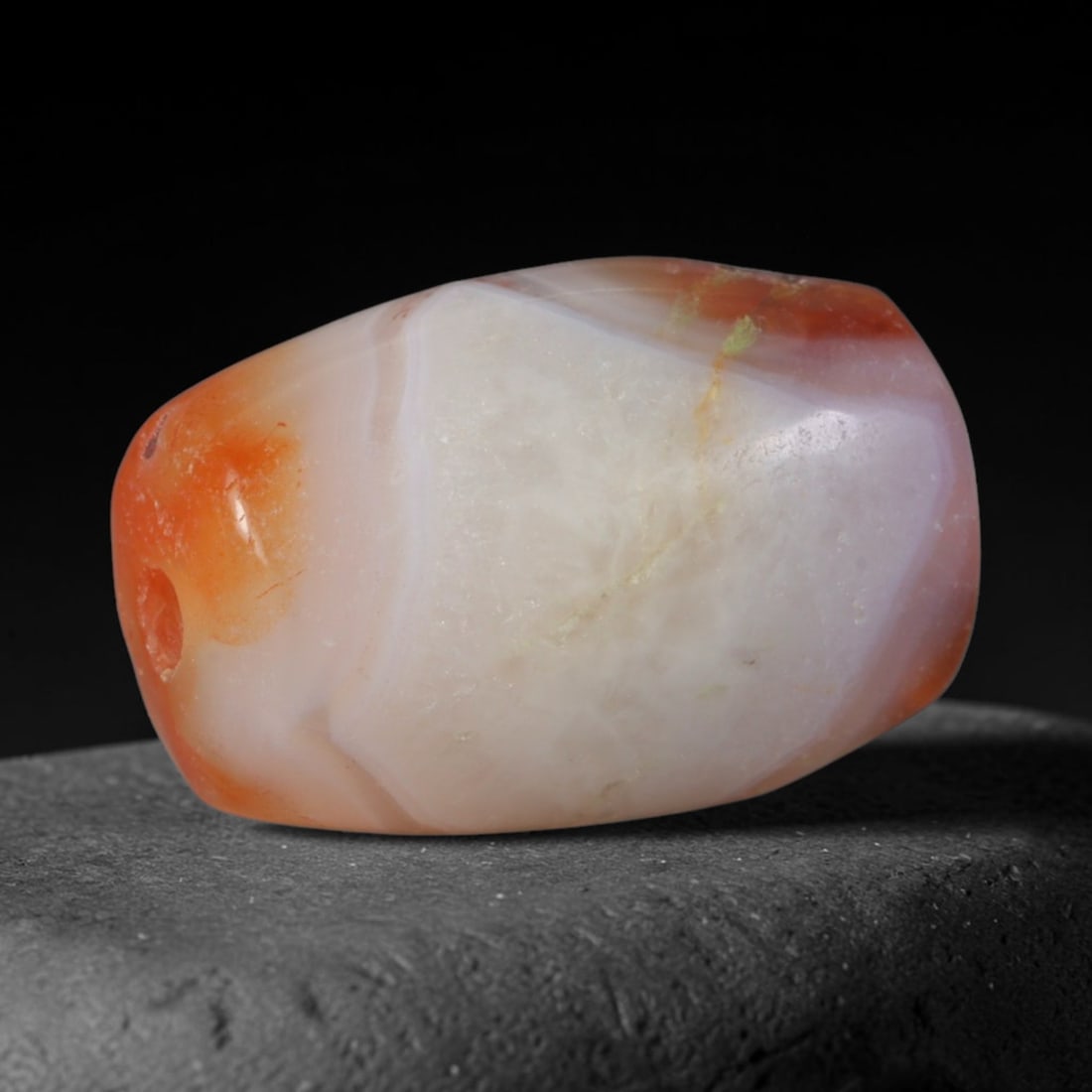 Ancient Mitannian Civilization Banded Agate Barrel Bead (1600-1260 BCE), 41AD: This antique banded agate barrel bead originates from the Mitannian Civilization, a cross-cultural Bronze Age power in Northern Mesopotamia renowned for refined agate lapidary production for royal rit