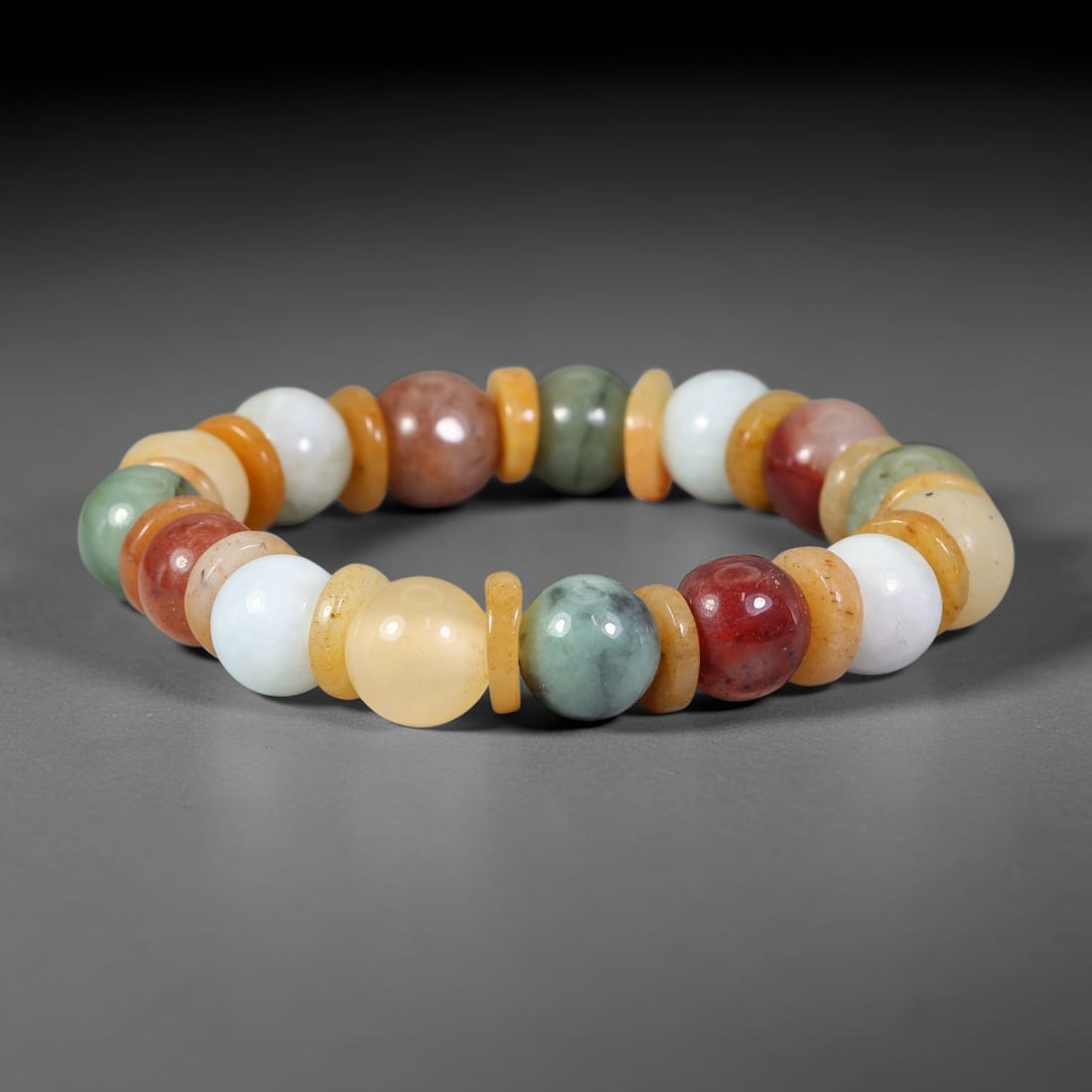 Natural Burmese Type A Jadeite Jade Beaded Bracelet, 18mm Beads, 65BK: Hand-strung bracelet crafted from polished untreated Burmese Type A jadeite jade beads. Every bead features smooth refined polishing with clean centered drill holes for sturdy flexible stringing. Auth