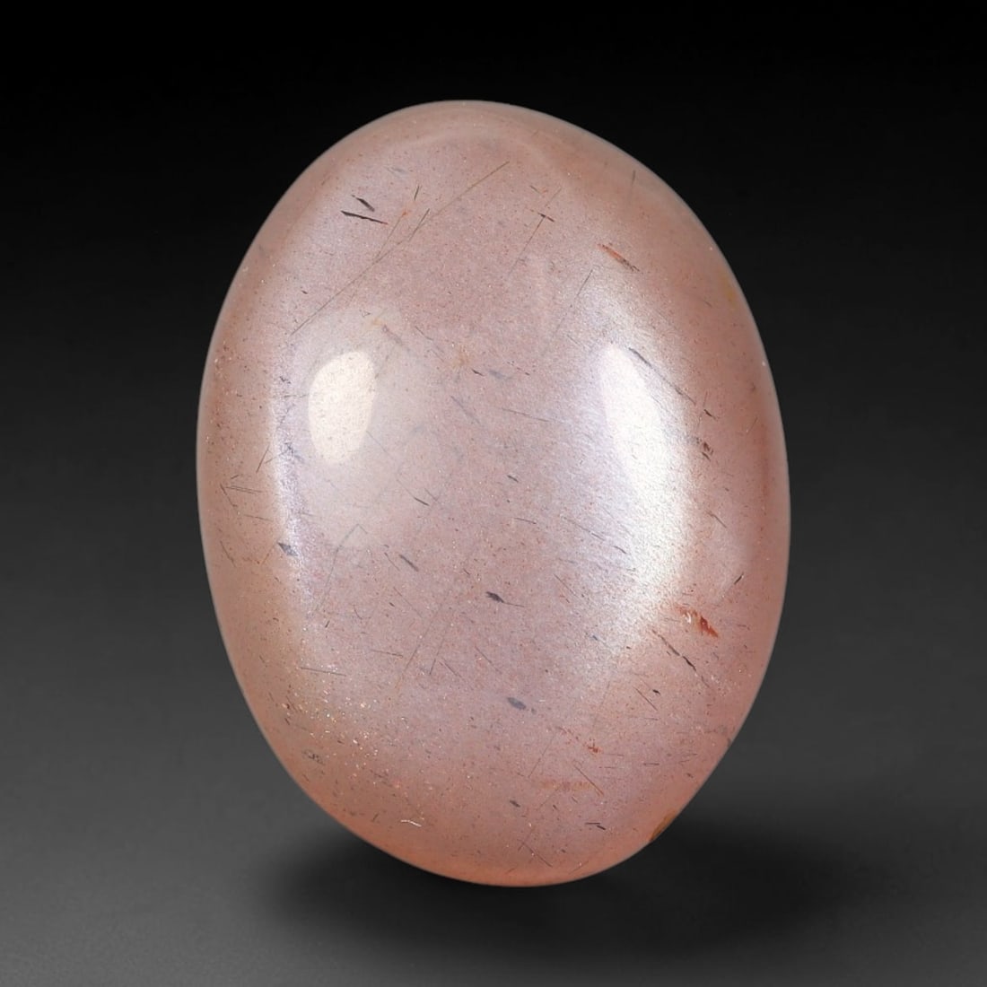 11.37 Carats Natural Ceylon Warm Peach Moonstone Loose Gemstone, 86FE: This natural Ceylon moonstone has dimension measurements of 18.8x14.1x5.8mm, showcasing a smooth warm peach base tone paired with subtle soft adularescent sheen that glides gently across the polished 