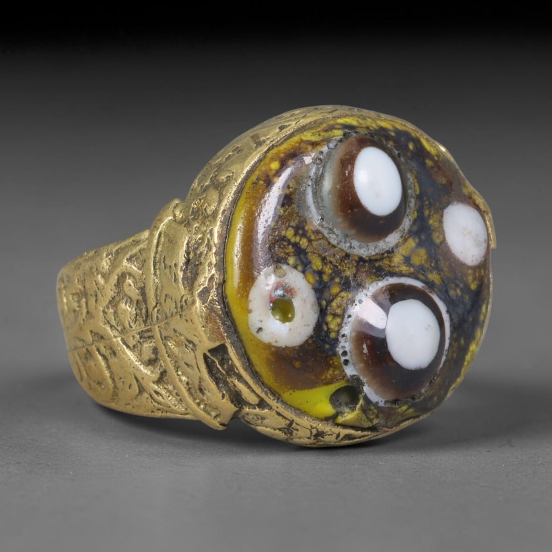 Antique Islamic Millefiori Evil Eye Glass Cabochon Set Vintage Signet Ring (1700-1900 CE), 57AM: The primary collectible value resides within the inset antique millefiori evil-eye glass cabochon, authentic genuine antique glass (distinguished from earlier ancient glass and modern vintage glass) c