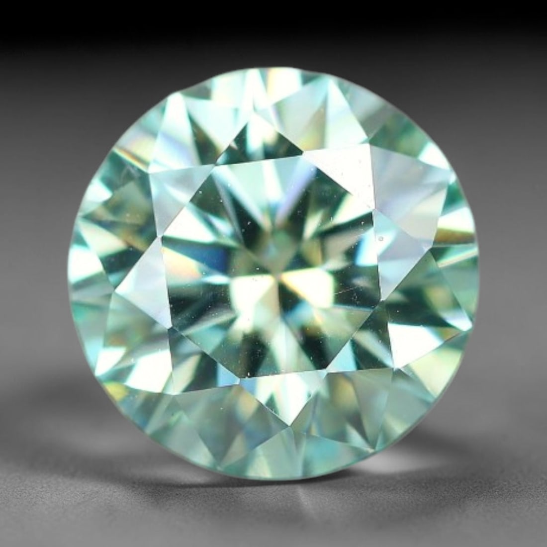 0.80 Carats Natural Light Blue Moissanite Loose Gemstone, 21FP: This lab-grown light blue moissanite features dimensions of 6x3.7mm, crafted from silicon carbide renowned for superior refractive index that delivers intense rainbow sparkle under all light sources. 