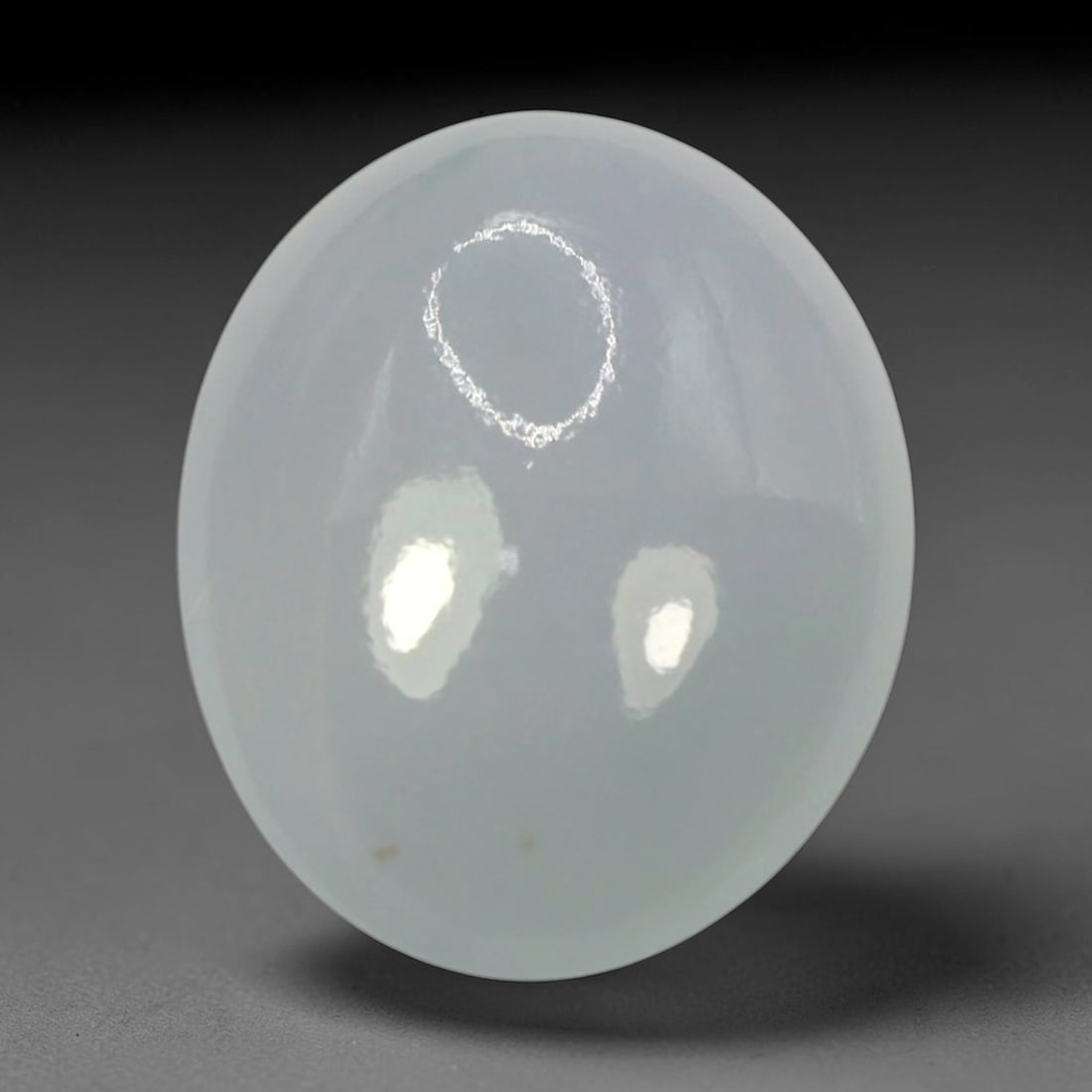 5.19ct Natural Burmese Type A Bluish White Jadeite Jade Cabochon, 5BP: This single loose natural Burmese Type A jadeite jade cabochon with exact dimensions of 13.7x10.9x4.4mm. It is completely untreated, free of artificial dye, bleaching, or resin filling, preserving the