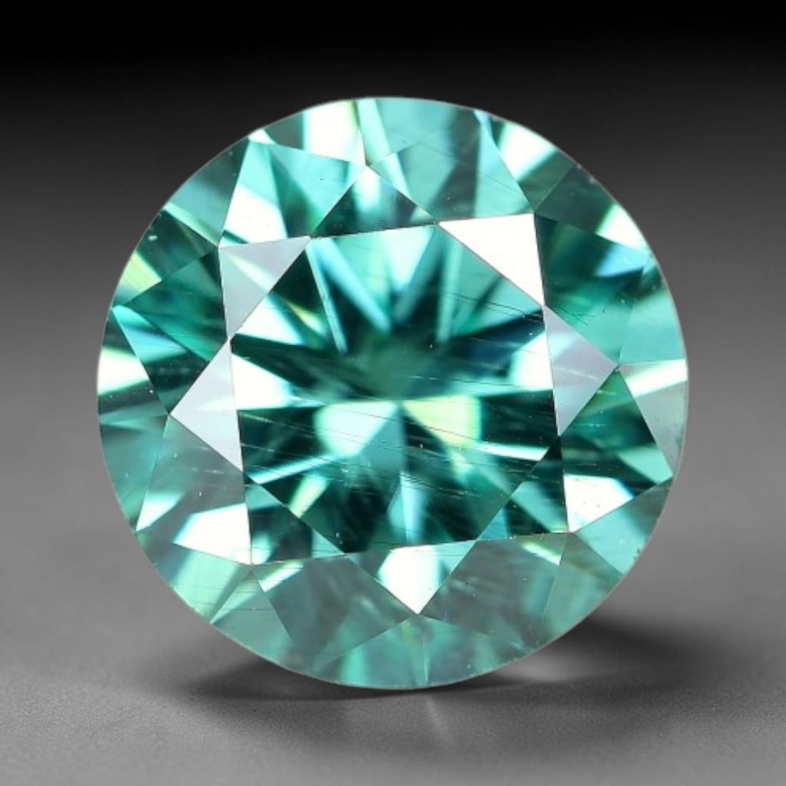 0.94 Carats Natural Teal Green Moissanite Loose Gemstone, 32FP: This lab-grown teal green moissanite measures 6.4x4mm, composed of silicon carbide with an outstanding refractive index that yields vivid, multi-hued sparkle in all lighting. Fine natural micro crysta