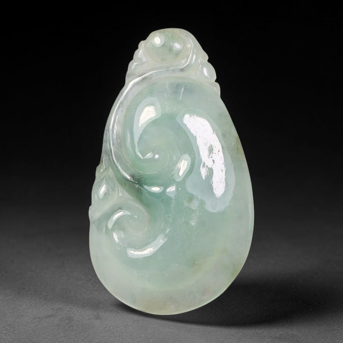 Natural Burmese Type A Jadeite Jade Hand Carved Pendant, 70BL: Artisan hand-carved untreated Burmese Type A jadeite jade pendant measuring 31x18 mm. Carefully sculpted with detailed relief craftsmanship and finished with a smooth glossy polish. Authentic Type A j