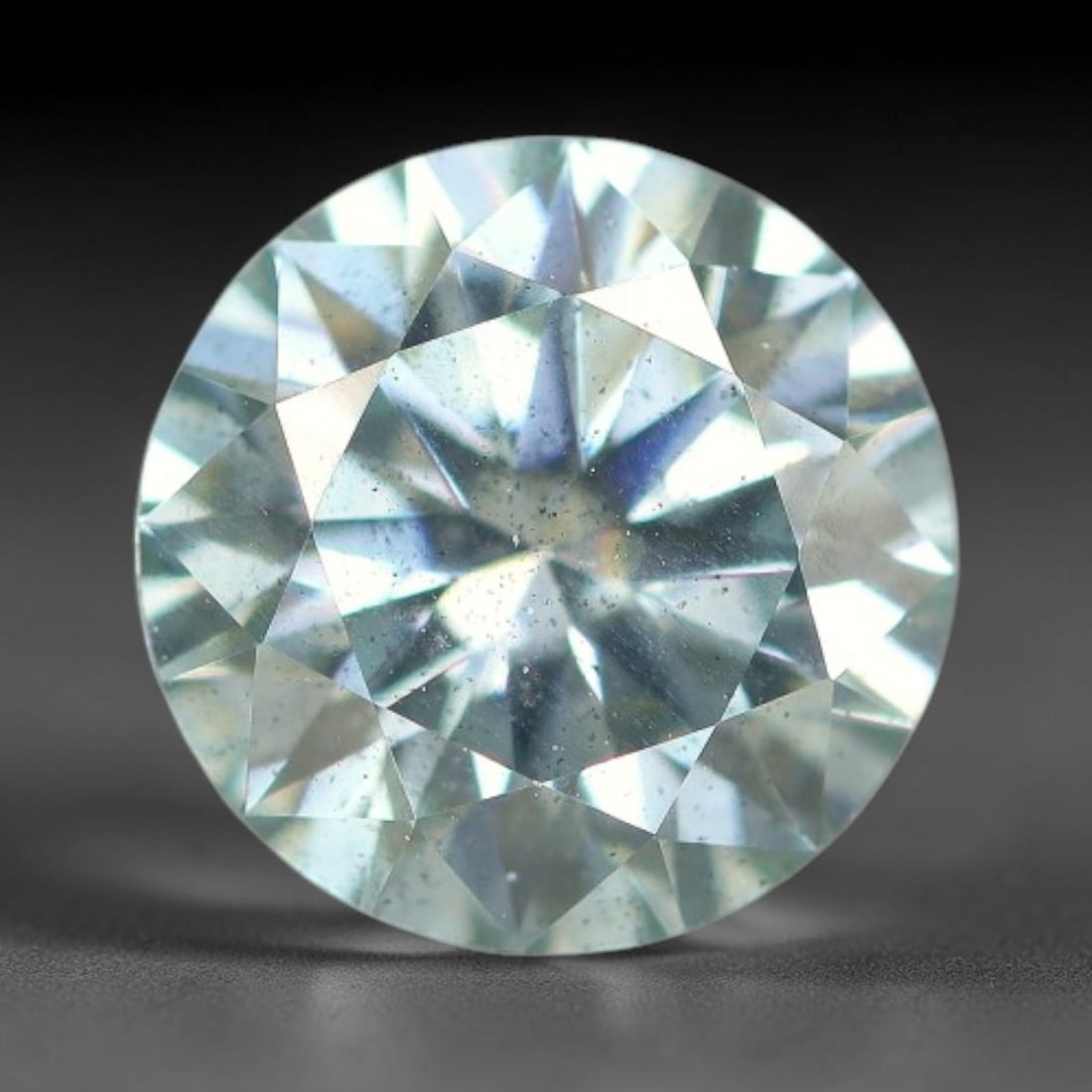 0.97 Carats Natural Light Blue Moissanite Loose Gemstone, 24FP: This lab-grown light blue moissanite features dimensions of 6.5x3.9mm, crafted from silicon carbide renowned for superior refractive index that delivers intense rainbow sparkle under all light sources