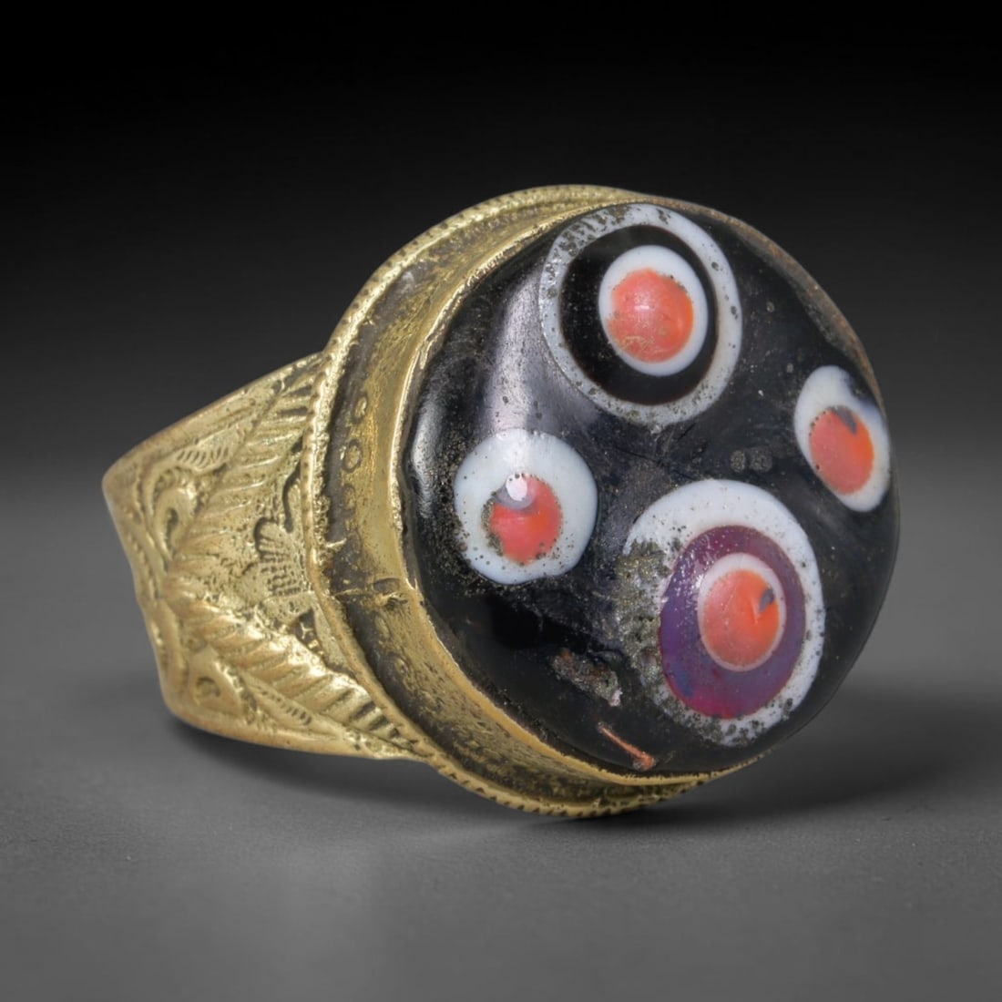 Antique Islamic Millefiori Evil Eye Glass Cabochon Set Vintage Signet Ring (1700-1900 CE), 32AM: The primary collectible value resides within the inset antique millefiori evil-eye glass cabochon, authentic genuine antique glass (distinguished from earlier ancient glass and modern vintage glass) c