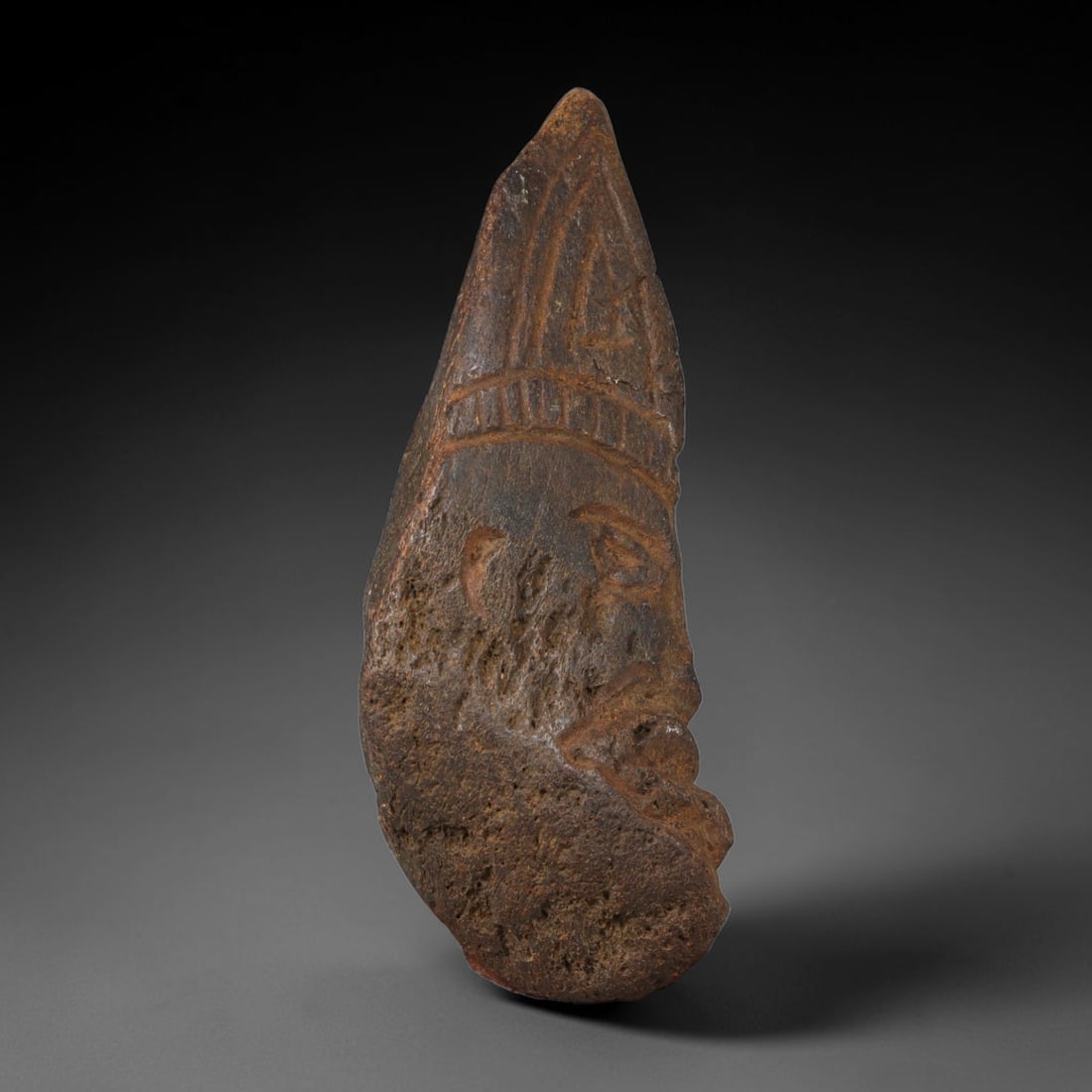 Ancient Medieval Near Eastern Tribal Hand Carved Fossil Bone Effigy Amulet, 81AP: Mid-sized antique wearable sacred effigy meticulously carved from natural fossil bone material, originating from Medieval Near Eastern tribal folk craft traditions. Fossil bone was a meaningful organi