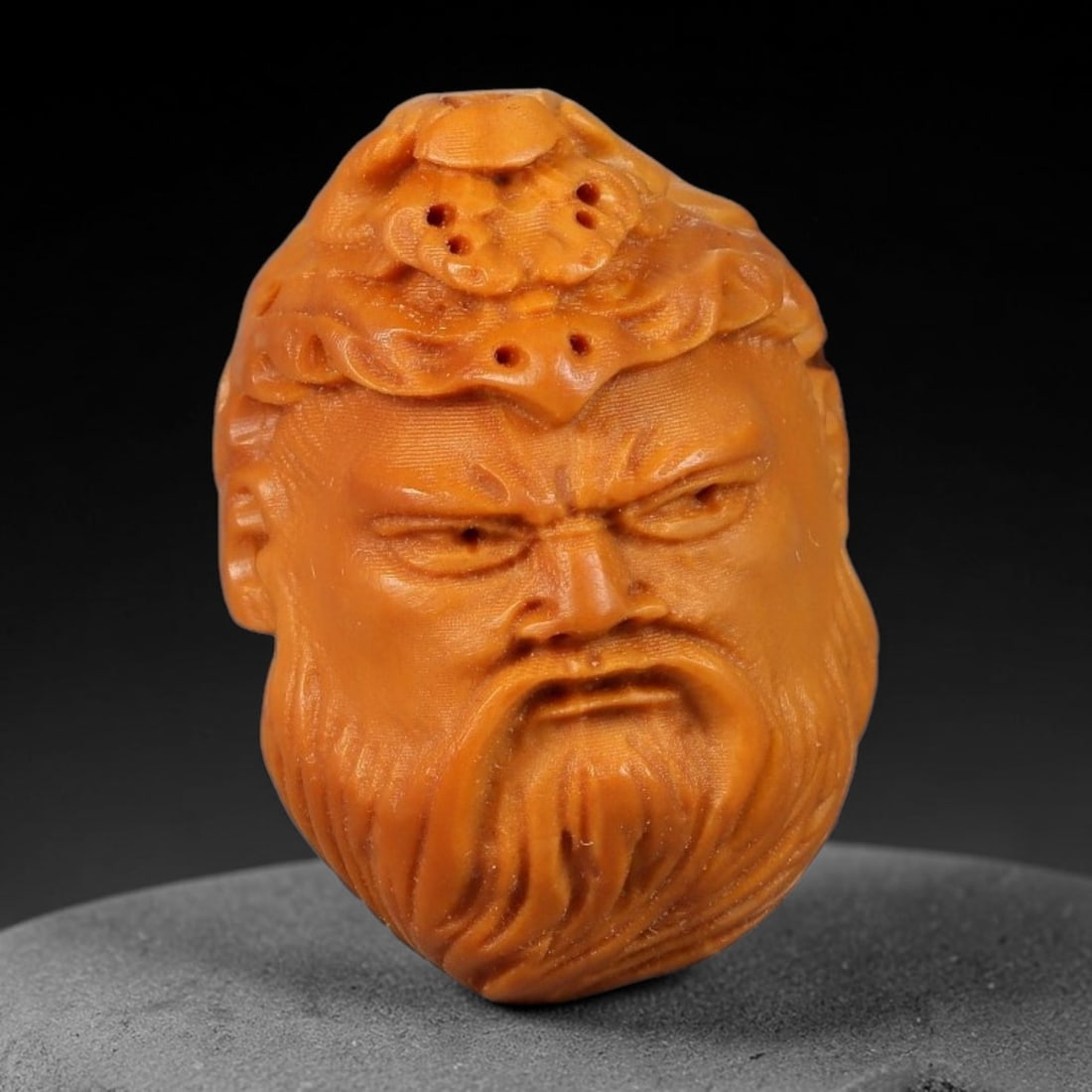 A Chinese Carved Natural Olive Nut Drilled Art Bead, 38BZ: Traditional craft bead carved from solid natural olive nut core, representing a classic miniature Chinese micro-carving folk art piece with a pre-drilled suspension bore integrated for easy threading 