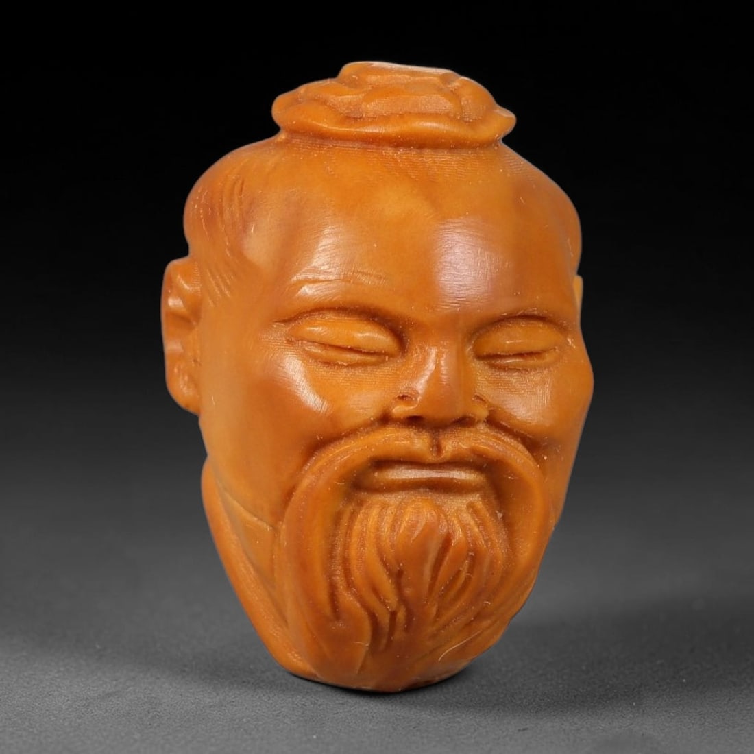 A Chinese Carved Natural Olive Nut Drilled Art Bead, 34BZ: Traditional craft bead carved from solid natural olive nut core, representing a classic miniature Chinese micro-carving folk art piece with a pre-drilled suspension bore integrated for easy threading 