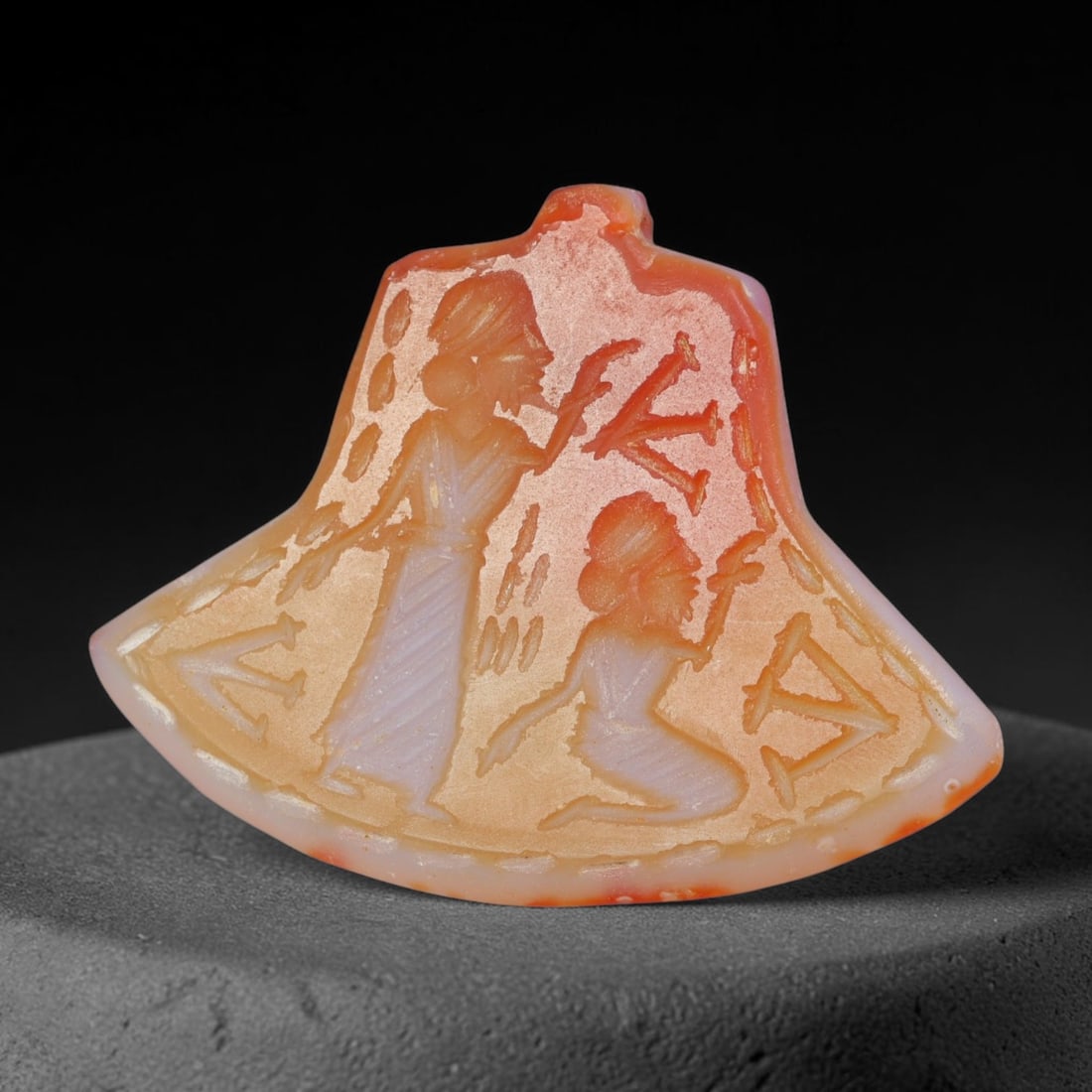 Vintage Natural Carnelian Agate Revival Indo-Persian Glyptic Figural Talisman Amulet Plaque, 58FK: This vintage talisman pendant plaque is skillfully carved from natural banded carnelian agate, crafted in a style referencing ancient Indo-Persian glyptic art traditions. The face bears detailed relie