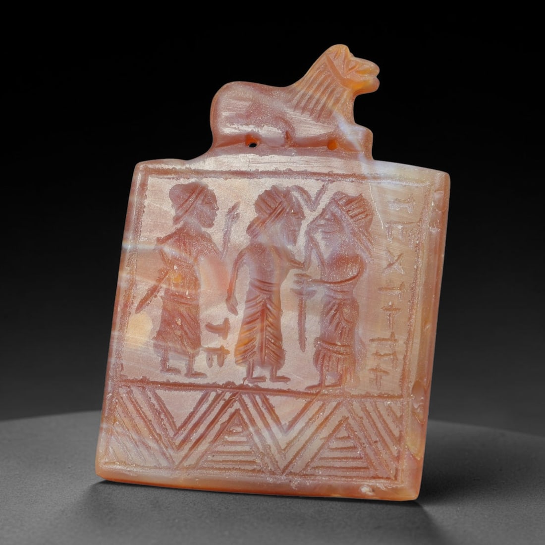 Vintage Natural Carnelian Agate Revival Indo-Persian Glyptic Figural Talisman Amulet Plaque, 31FK: This vintage talisman pendant plaque is skillfully carved from natural banded carnelian agate, crafted in a style referencing ancient Indo-Persian glyptic art traditions. The face bears detailed relie
