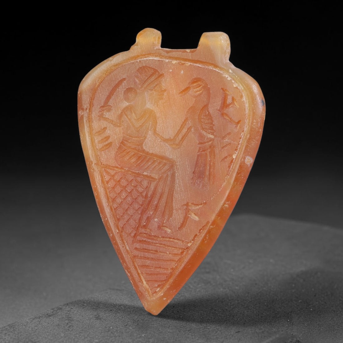 Vintage Natural Carnelian Agate Revival Indo-Persian Glyptic Figural Talisman Amulet Plaque, 56FK: This vintage talisman pendant plaque is skillfully carved from natural banded carnelian agate, crafted in a style referencing ancient Indo-Persian glyptic art traditions. The face bears detailed relie