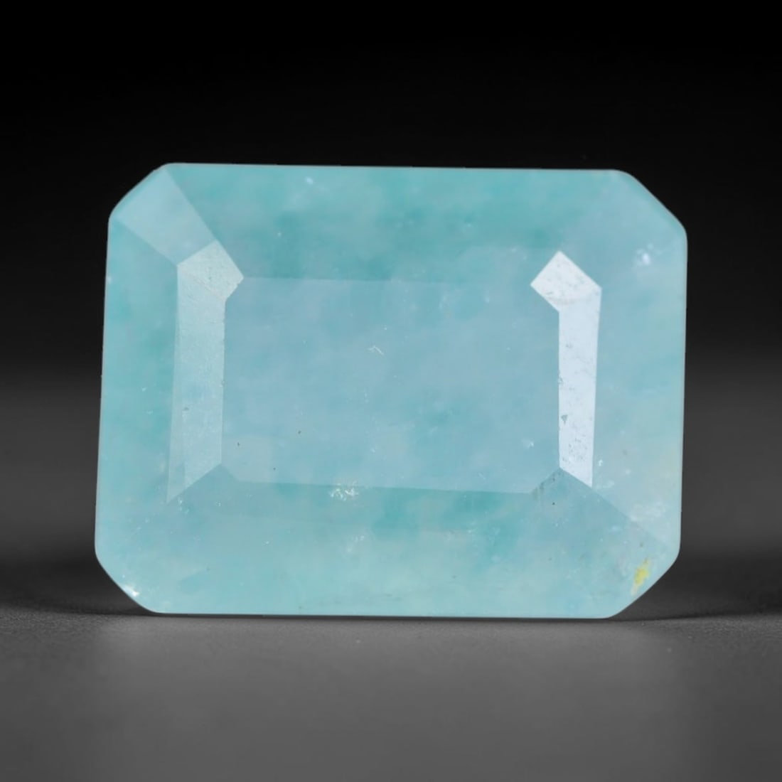 4.84ct Natural Madagascan Faceted Grandidierite Rare Loose Gemstone, 61BD: This expertly faceted finished grandidierite holds soft translucent body tone with fine faint natural internal veining visible beneath precisely cut reflective facets within its 12.2x9.2x5mm calibrate