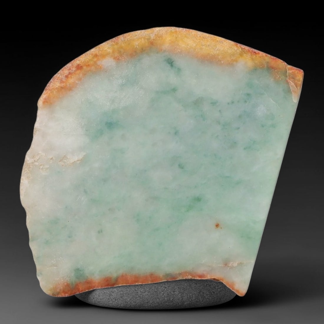 233ct Natural Type A Burmese Jadeite Jade Sliced Rough, 38AZ: This specimen is a sliced rough block of natural Type A Burmese jadeite jade. The interior displays natural colour zoning with visible mineral veining and crystalline patterns typical of unprocessed j