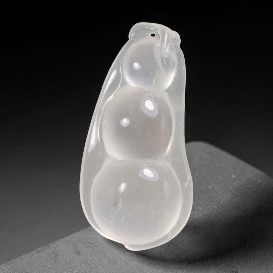 Natural Burmese Quartzite Hand Carved Pendant, 16BP: Artisan hand-carved natural Burmese quartzite pendant measuring 51x25 mm. Expertly shaped and polished by master craftsmen, showcasing excellent natural crystalline clarity with subtle native mineral 