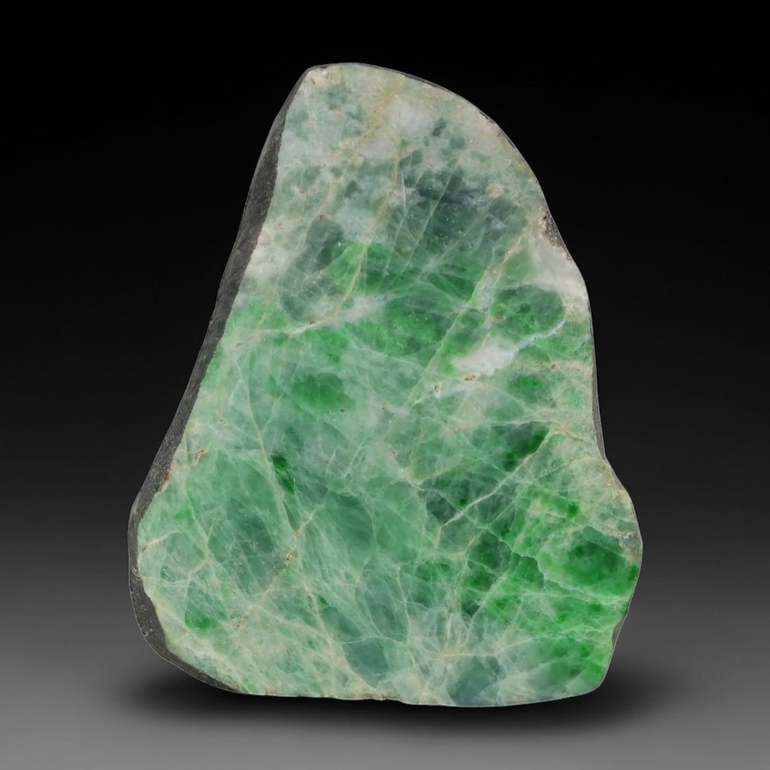 216ct Natural Type A Burmese Jadeite Jade Sliced Rough, 99AY: This specimen is a sliced rough block of natural Type A Burmese jadeite jade. The interior displays natural colour zoning with visible mineral veining and crystalline patterns typical of unprocessed j