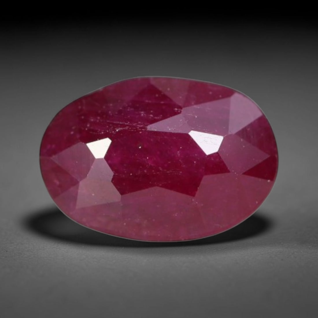 1.16ct Natural Tanzanian Longido Deep Crimson Red Faceted Ruby Loose Gemstone, 81BC: This expertly faceted Longido ruby features a rich deep crimson red body tone with distinct natural linear mineral striations, scattered pale mineral deposits and minor dark mineral flecks visible wit