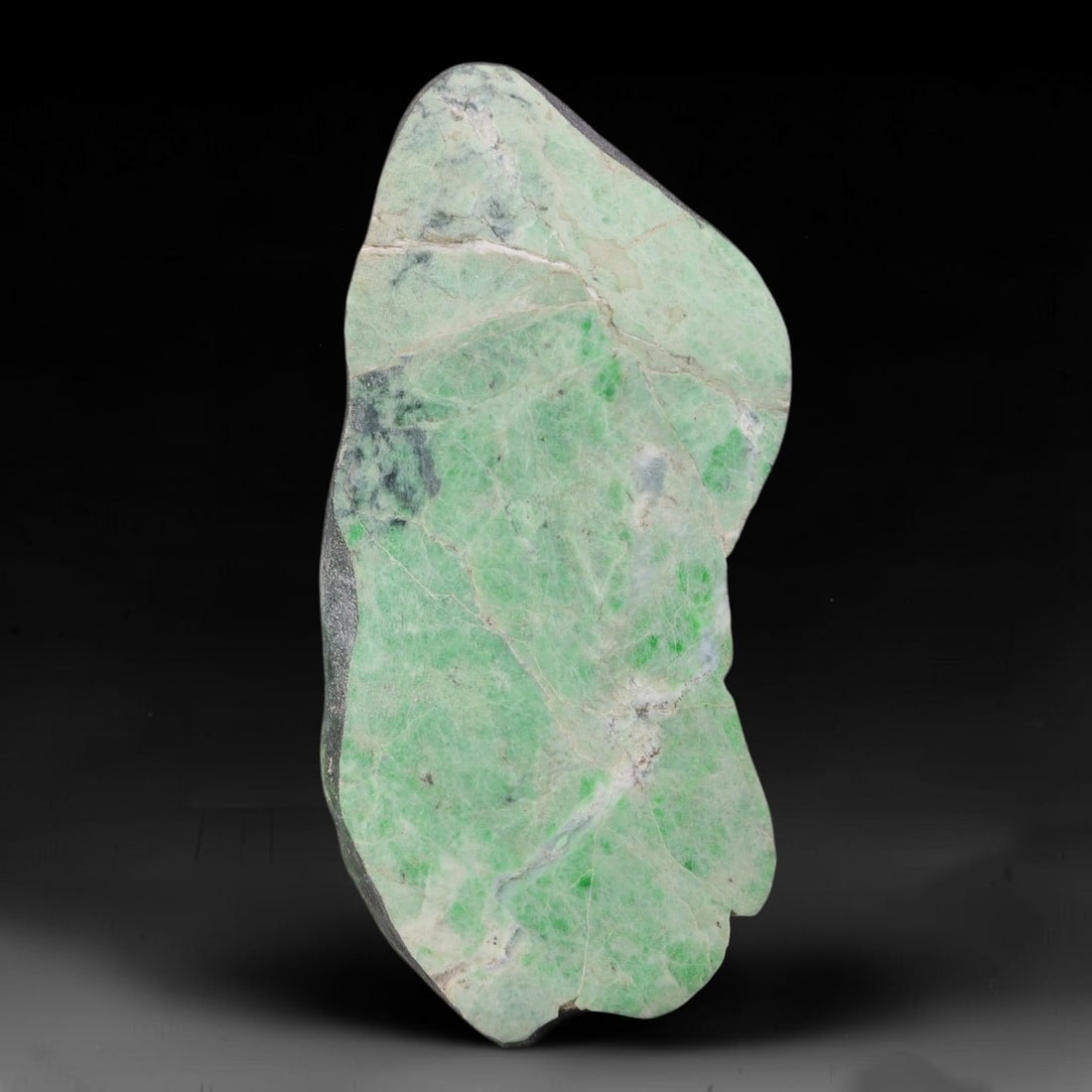 400ct Natural Type A Burmese Jadeite Jade Sliced Rough, 31AZ: This specimen is a sliced rough block of natural Type A Burmese jadeite jade. The interior displays natural colour zoning with visible mineral veining and crystalline patterns typical of unprocessed j