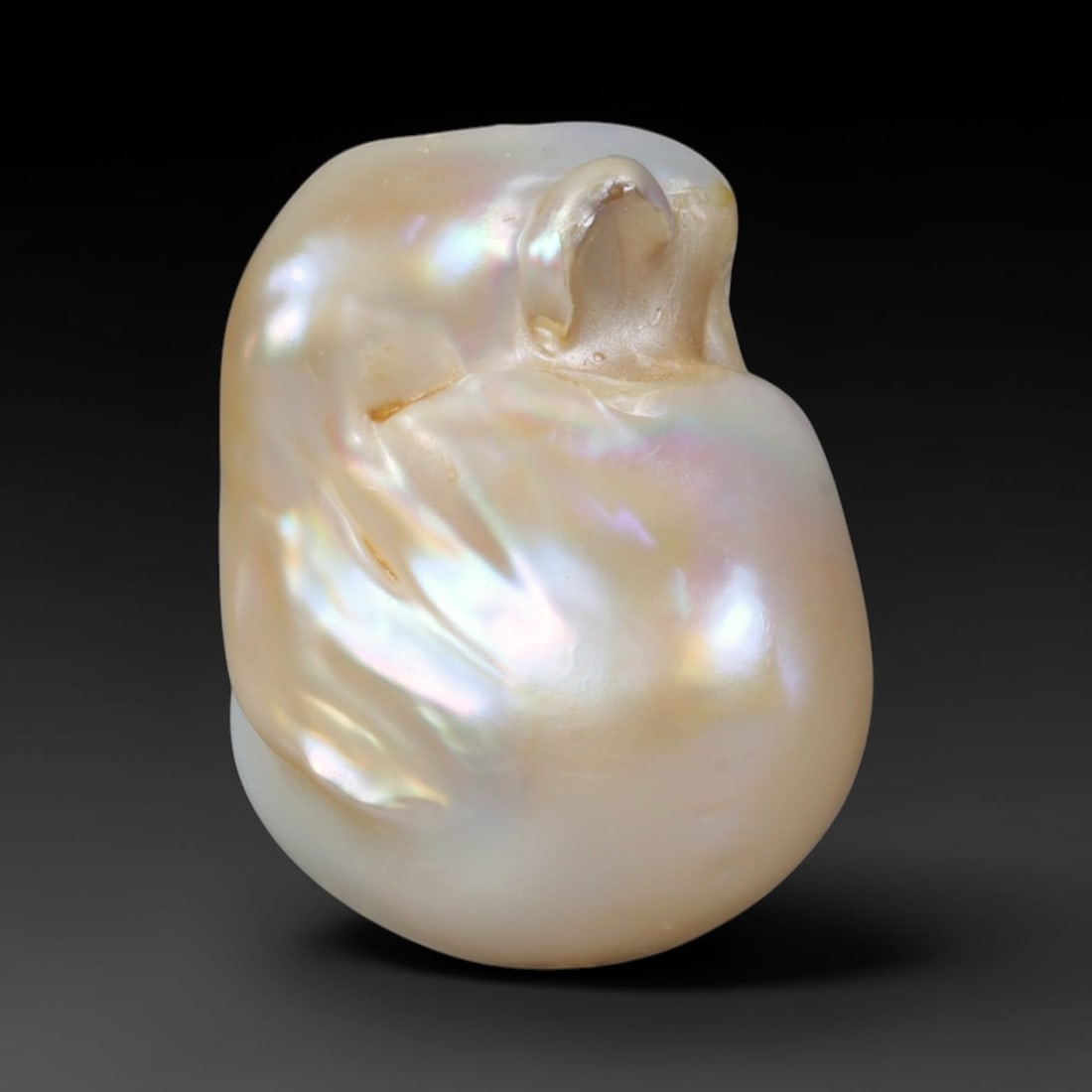 Natural Freshwater Keshi Pearl - Iridescent Baroque Pearl Ornament, 53AE: A natural freshwater keshi pearl with organic asymmetrical baroque shaping, exhibiting soft creamy blush base tones with shifting pastel pink, lavender and pale gold iridescent luster across its smoot