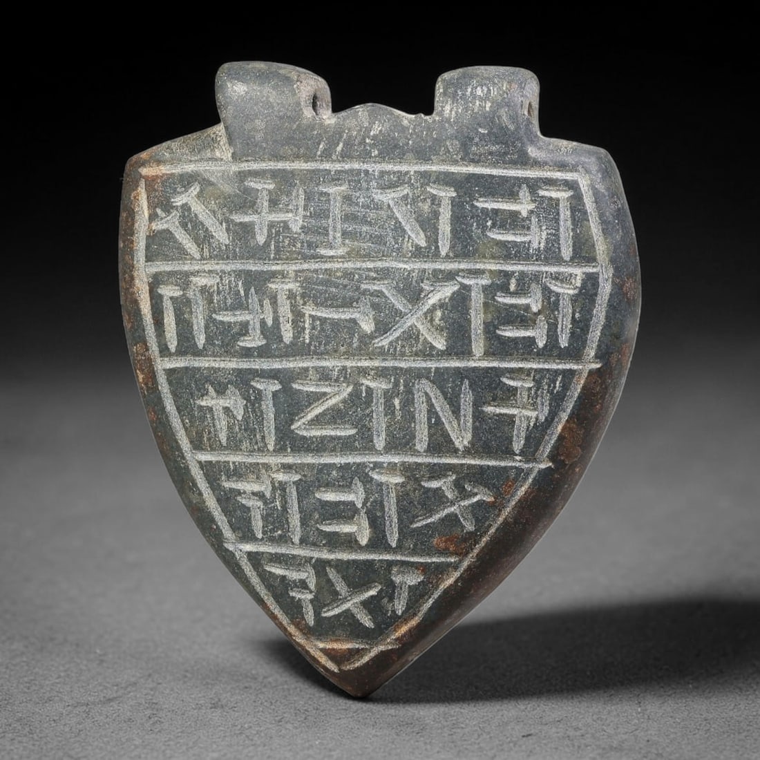 Vintage Uruk Revival Carved Stone Cuneiform Talisman Pendant Plaque, 23FK: This vintage pendant is hand-carved from dark mineral stone, designed in revival style inspired by ancient Uruk glyptic traditions. The surface features neatly arranged horizontal bands of stylized cu