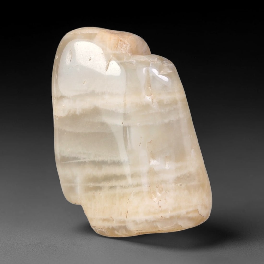 53ct Natural Ceylon Pale Cream White Moonstone Rough, 60AH: This smooth weathered moonstone rough carries soft pale cream white translucency with subtle internal silvery adularescent shimmer locked within its naturally tumbled surface, fine faint mineral veini