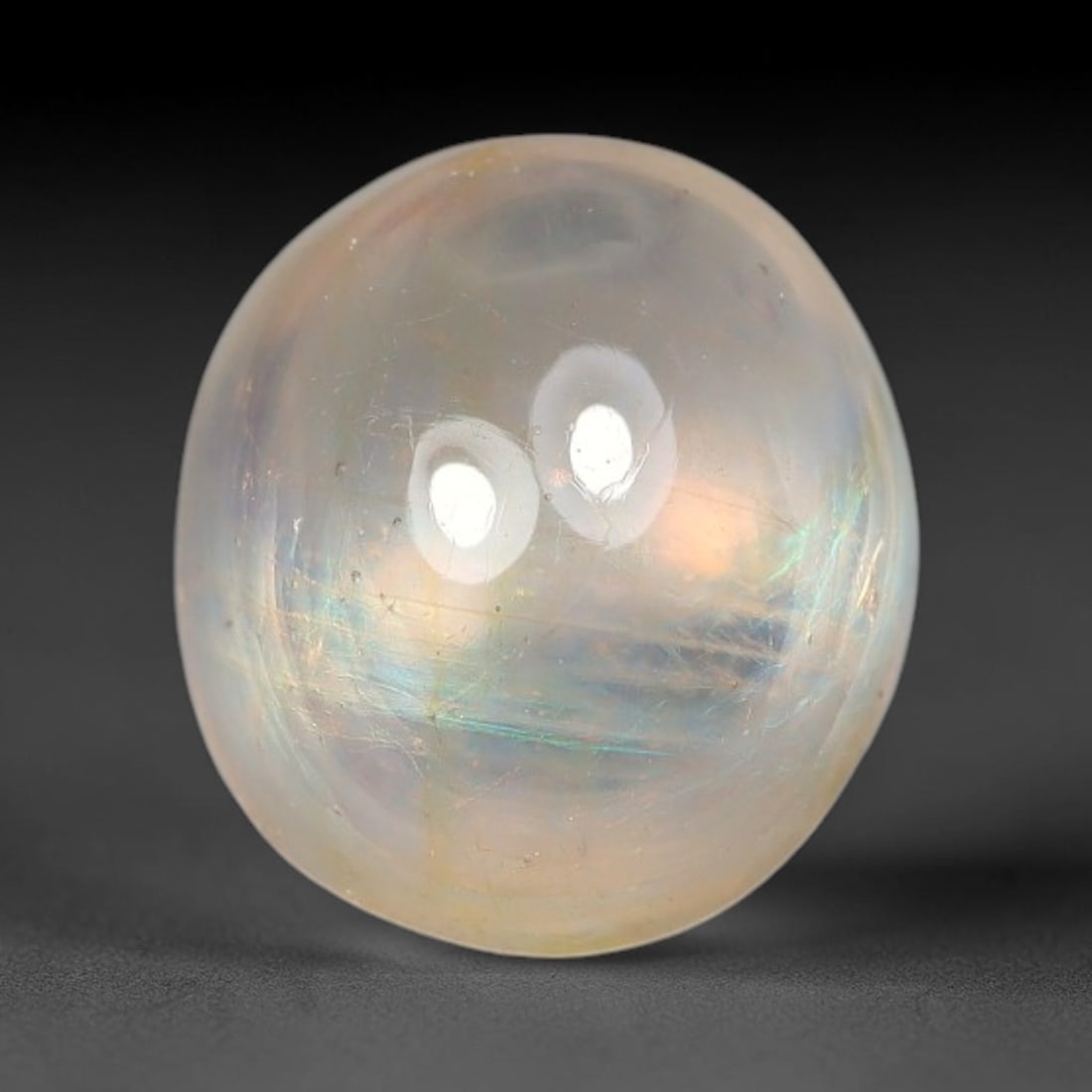 2.04ct Natural Sri Lankan Padparadscha Sapphire Loose Gemstone, 74BF: This fully polished Padparadscha sapphire features soft warm peach-orange blended body tone, with faint natural mineral traces scattered throughout its crystalline interior, measured at calibrated dim