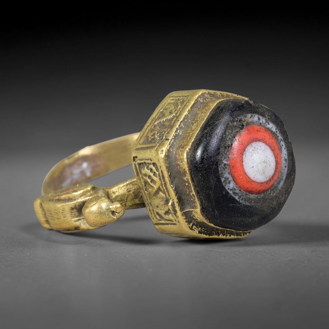 Antique Islamic Millefiori Evil Eye Glass Cabochon Set Vintage Signet Ring (1700-1900 CE), 100AM: The primary collectible value resides within the inset antique millefiori evil-eye glass cabochon, authentic genuine antique glass (distinguished from earlier ancient glass and modern vintage glass) c