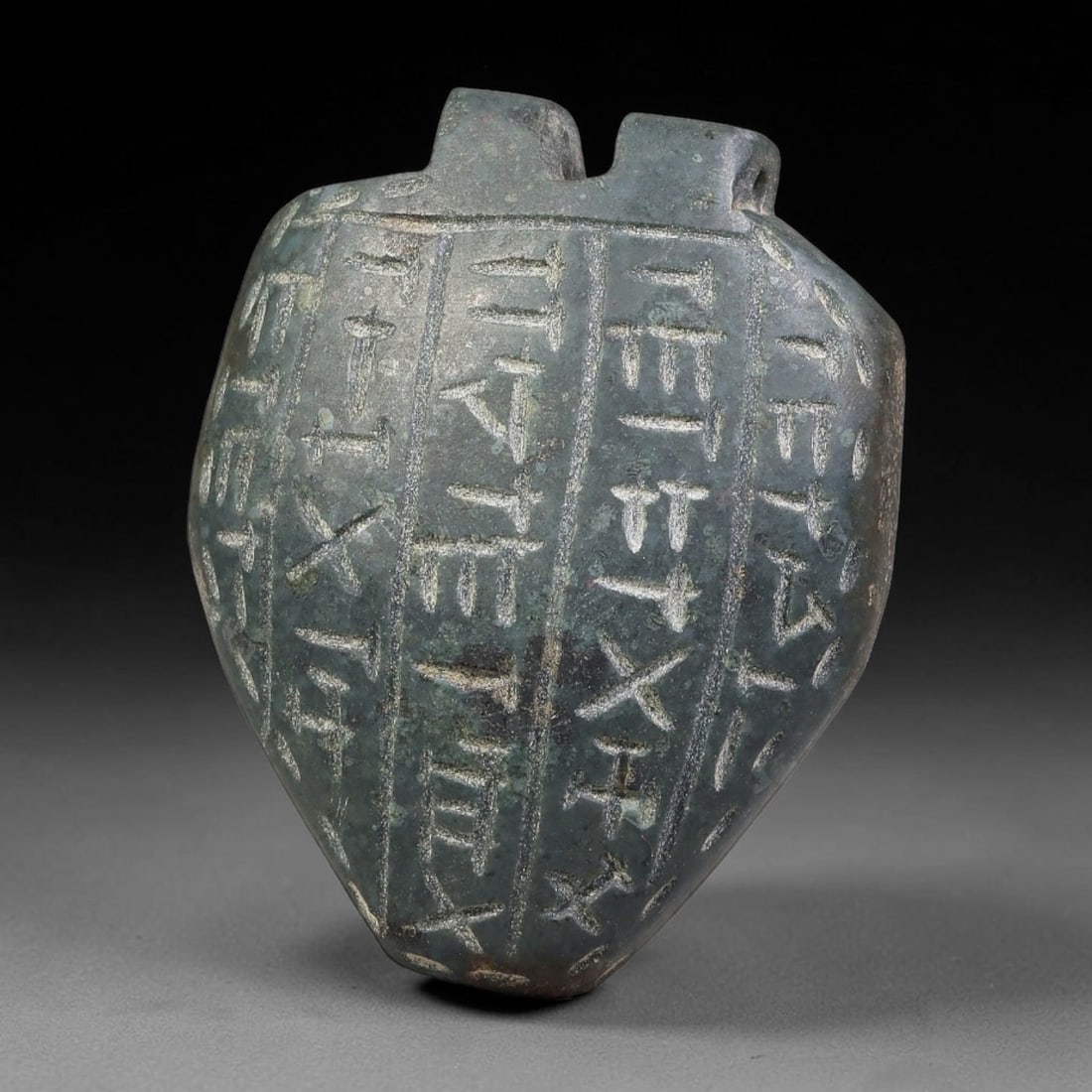 Vintage Uruk Revival Carved Stone Cuneiform Talisman Pendant Plaque, 87FK: This vintage pendant is hand-carved from dark mineral stone, designed in revival style inspired by ancient Uruk glyptic traditions. The surface features neatly arranged horizontal bands of stylized cu