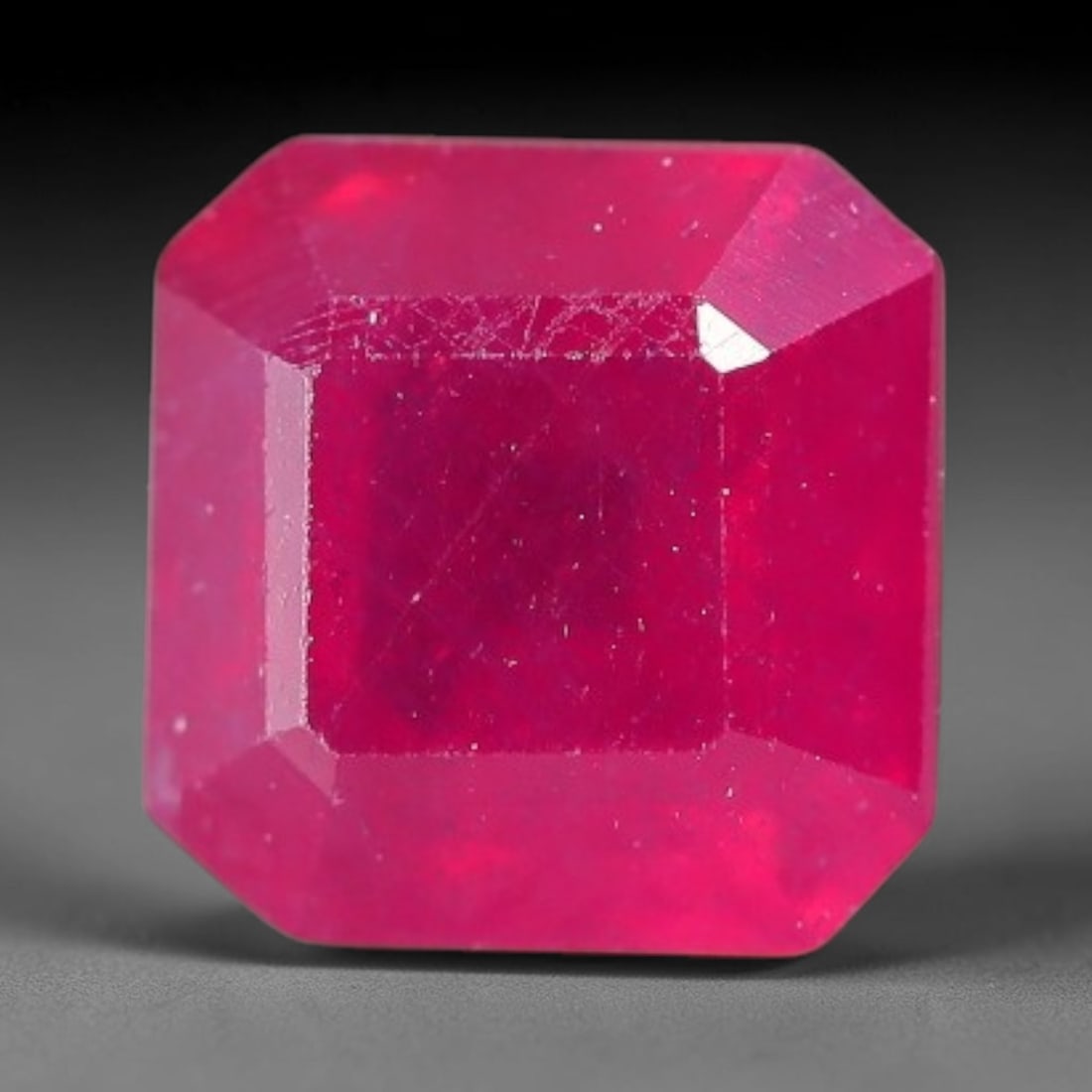 1.56 Carats Natural Madagascar Vivid Fuchsia Red Heated Ruby Loose Gemstone, 61FM: This vivid fuchsia red Madagascar ruby displays rich saturated red tone with subtle natural internal mineral traces that showcase genuine earth-grown character, measured at 6x4.1mm, the intense warm c