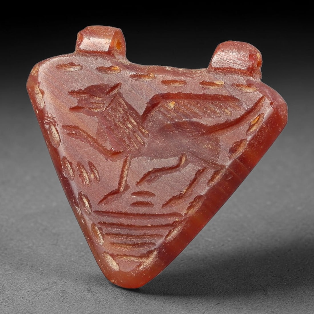 Vintage Natural Carnelian Agate Revival Indo-Persian Glyptic Figural Talisman Amulet Plaque, 6FL: This vintage talisman pendant plaque is skillfully carved from natural banded carnelian agate, crafted in a style referencing ancient Indo-Persian glyptic art traditions. The face bears detailed relie