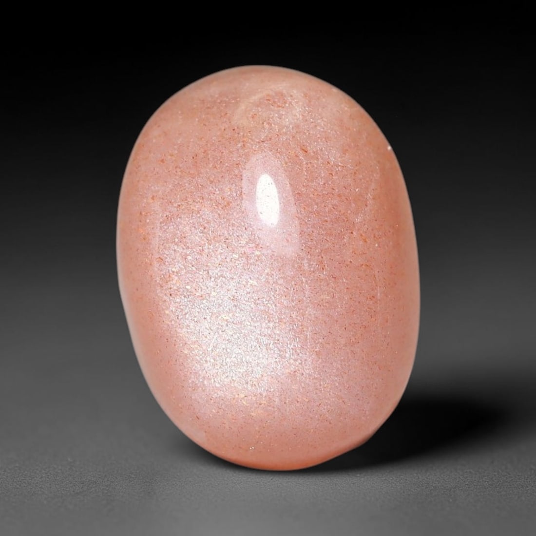 8.03ct Natural Ceylon Warm Peach Moonstone Loose Gemstone, 95FX: This natural Ceylon moonstone has dimension measurements of 14x11x6mm, showcasing a smooth warm peach base tone paired with subtle soft adularescent sheen that glides gently across the polished surfac