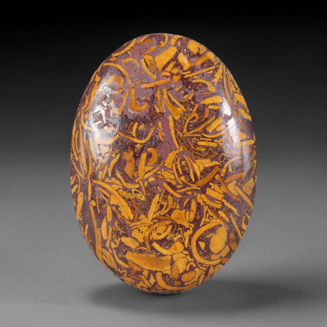29.47ct Natural Mariam Jasper (Calligraphy Stone) Cabochon Loose Gemstone, 15AK: This fully polished Mariam Jasper, widely referred to as Calligraphy Stone, features deep plum base matrix interlaced with intricate golden ochre fossilized mineral veining that creates natural brushs