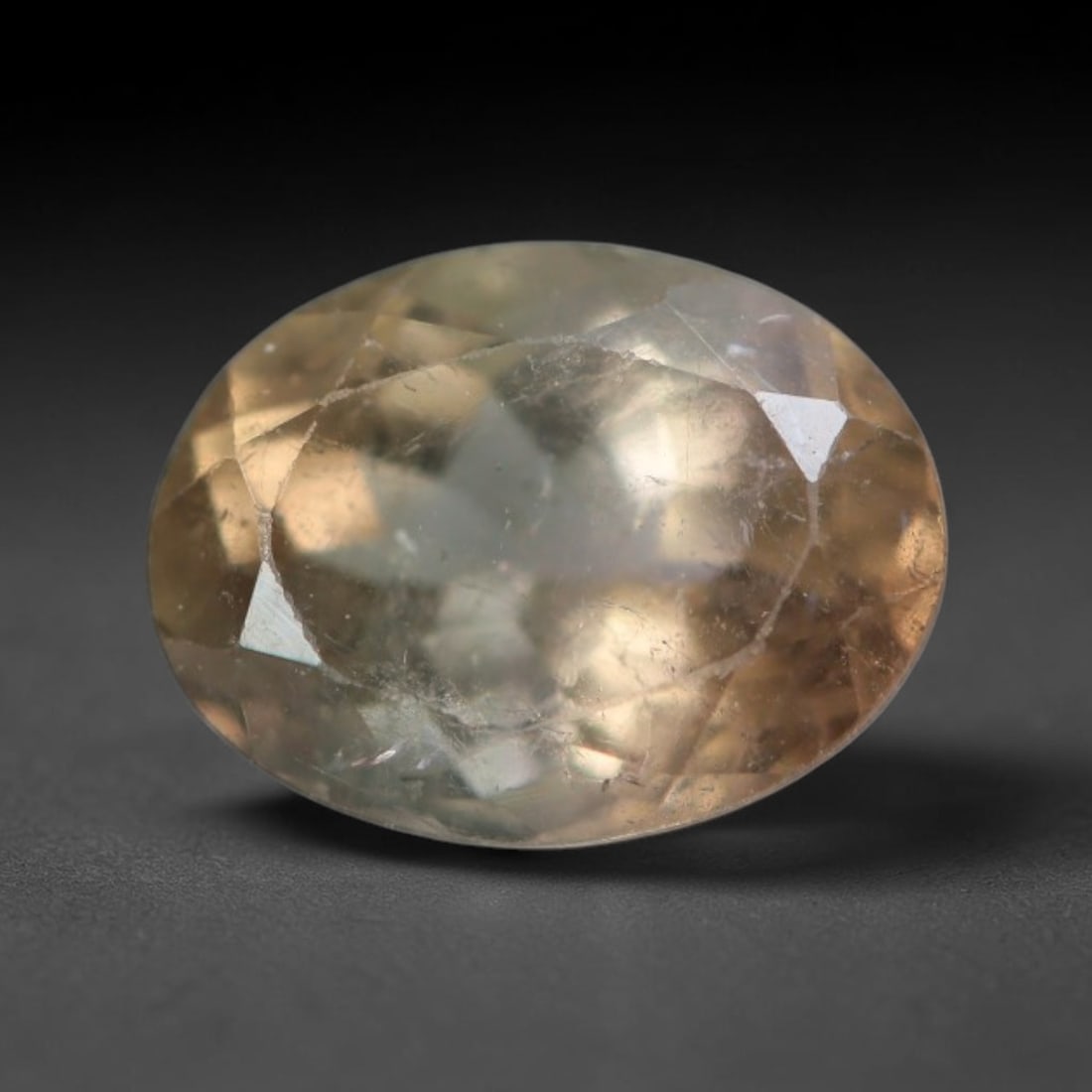 1.14 Carats Natural Mozambique Champagne Tourmaline Loose Gemstone, 36AK: This transparent Mozambique tourmaline holds soft warm champagne body tone, featuring fine natural internal fractures and faint mineral micro-specks scattered throughout its crystal matrix, measured a