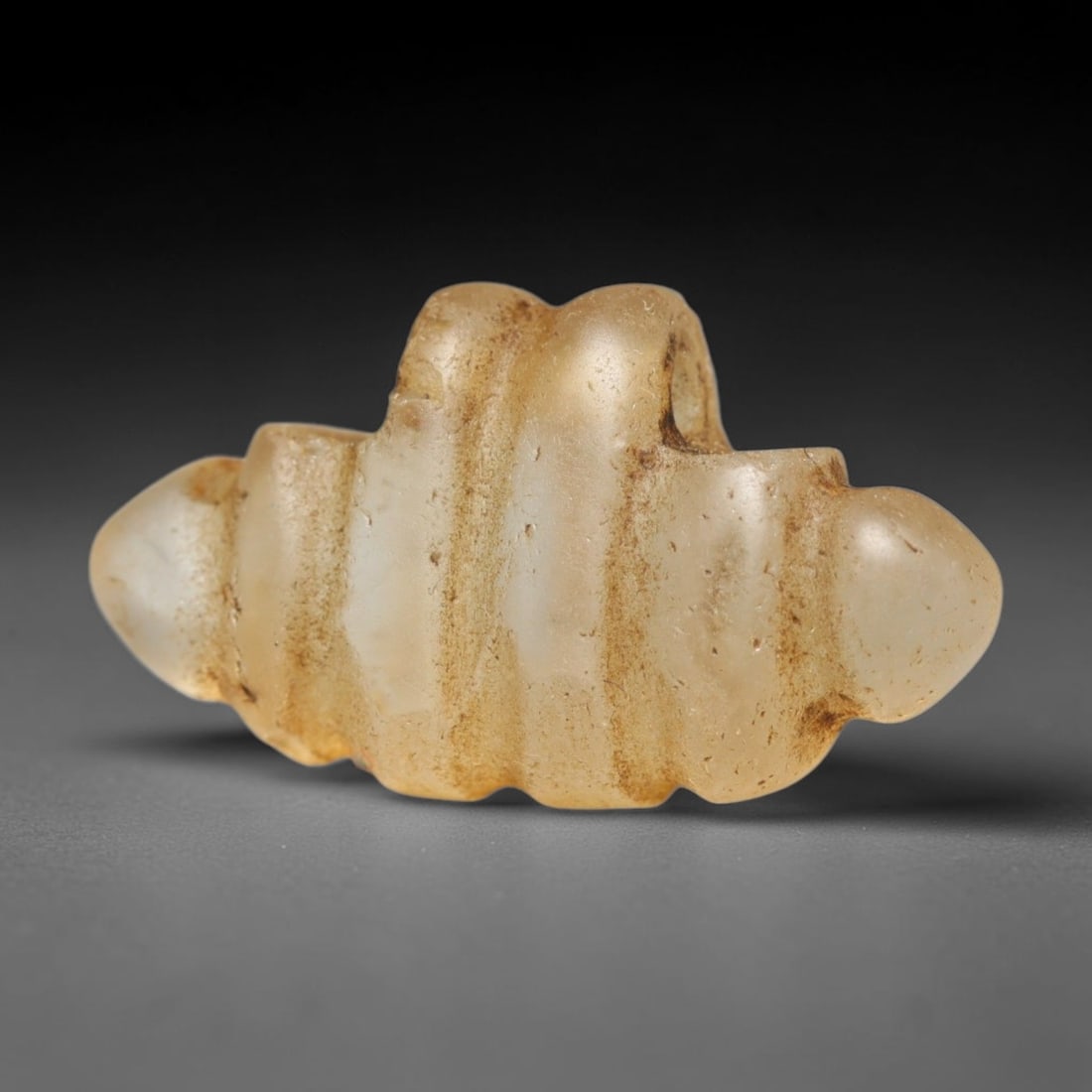 Ancient Medieval Coptic Christian Egyptian Culture Rock Crystal Amulet (300-1000 CE), 89FY: This antique rock crystal amulet originates from Coptic Christian Egyptian Culture, a region with a long-standing tradition of crafting translucent hardstone talismans for devotional and funerary use.