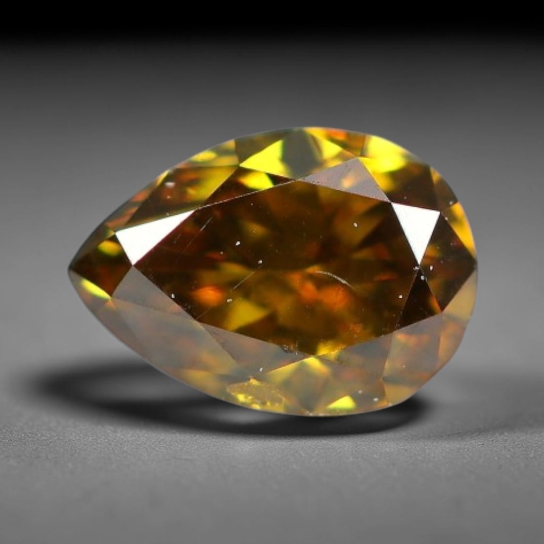 0.22ct Natural Untreated Fancy Olive Yellow Diamond Loose Gemstone, 30BG: This polished natural diamond showcases rich olive yellow blended body tone, with fine microscopic mineral specks dispersed within its crystal interior, measured at calibrated dimensions of 4.4x3.1x2.