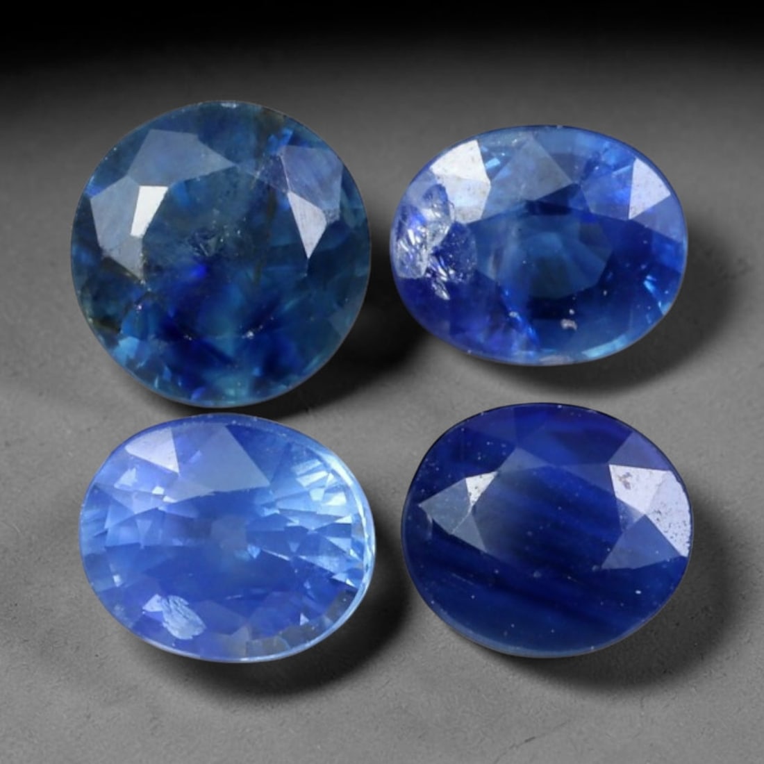 2.19ct Natural Australian Blue Sapphire Loose Gemstone Parcel, 88BV: This parcel consists of natural blue sapphire originating from Australia. The stones display varied cool blue tonal variation across the crystal material, polished with fine faceting to maximise light
