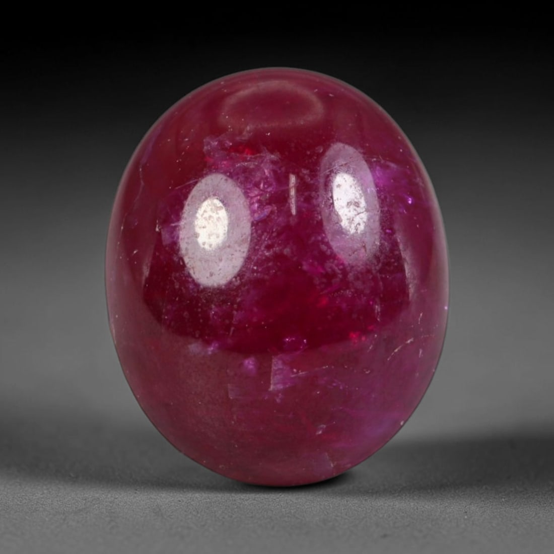 3.68ct Natural Mozambican Deep Crimson Red Ruby Cabochon Loose Gemstone, 21AS: This smoothly polished cabochon ruby holds a rich deep crimson red body hue, covered with fine natural surface fracturing and tiny scattered mineral specks across its domed polished surface within its