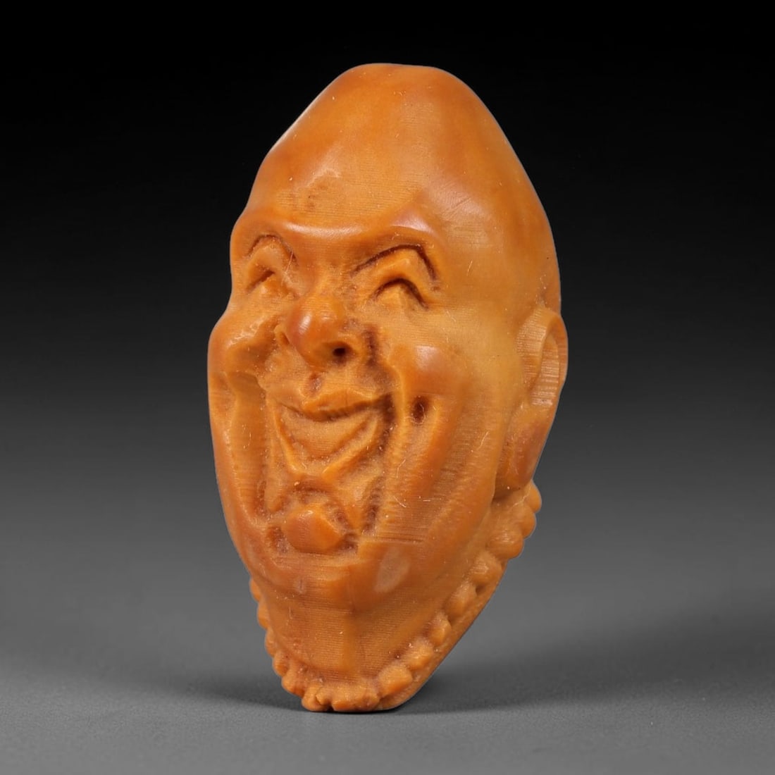A Chinese Carved Natural Olive Nut Drilled Art Bead, 16BZ: Traditional craft bead carved from solid natural olive nut core, representing a classic miniature Chinese micro-carving folk art piece with a pre-drilled suspension bore integrated for easy threading 