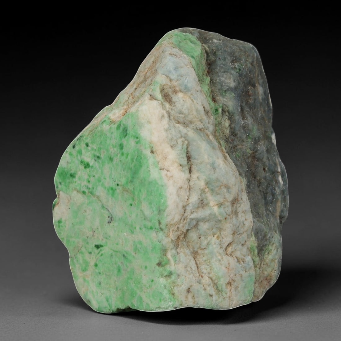 500ct Natural Burmese Moss in Snow Jadeite Rough - Bright Green & Grey Raw Stone, 58EA: This is a natural Type A Burmese jadeite rough stone, measuring 5x4.4cm and weighing 100g (500ct). It features the striking "Moss in Snow" pattern, with vivid bright green moss-like inclusions natural