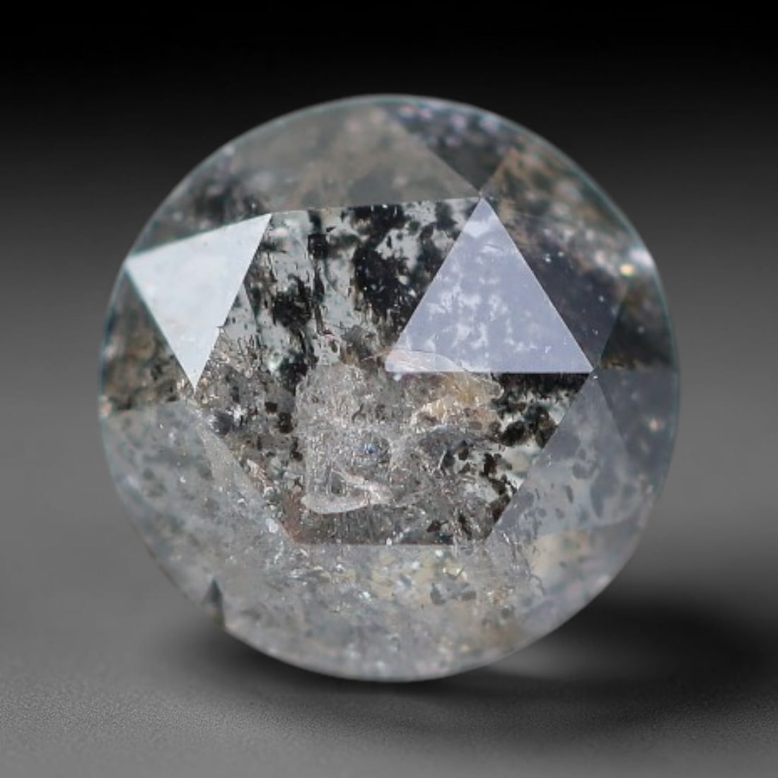 0.26ct Natural Untreated Salt And Pepper Round Rose Cut Diamond Loose Gemstone, 64BH: This polished natural salt and pepper diamond features a translucent pale base naturally scattered with distinctive dark mineral speckles and inclusions throughout its crystal interior, measured at ca