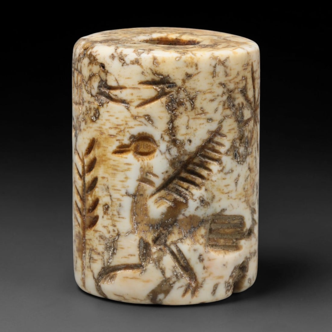 Ancient Babylonian White Stone Cylinder Seal (1900-600 BCE), 87EC: This white stone cylinder seal originates from Ancient Babylonian culture of Mesopotamia, an essential administrative and ritual artifact within ancient Near Eastern civilisation. The cylindrical ston