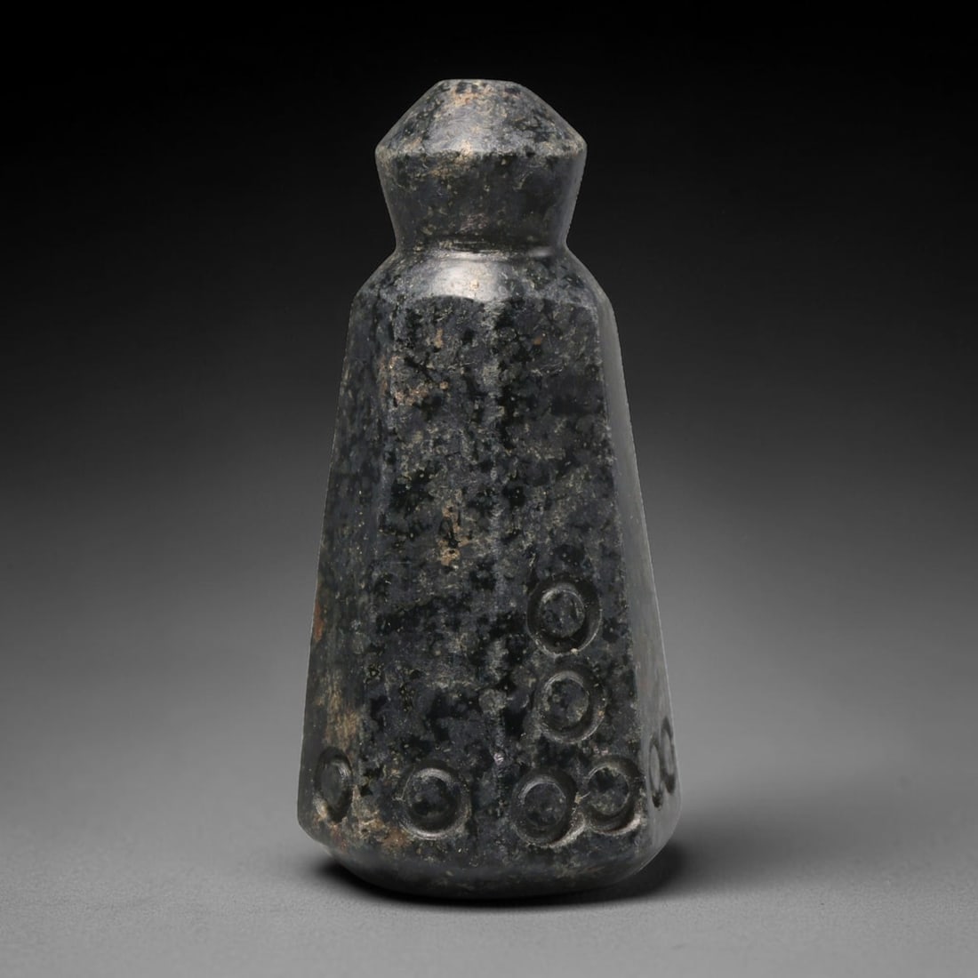 Ancient Medieval Mamluk Levantine Stone Talisman (1250-1517 CE), 57EC: This antique dark stone tapered talisman originates from Mamluk Levantine Culture, famed for crafting portable protective stone amulets circulated along pilgrimage and regional trade networks througho