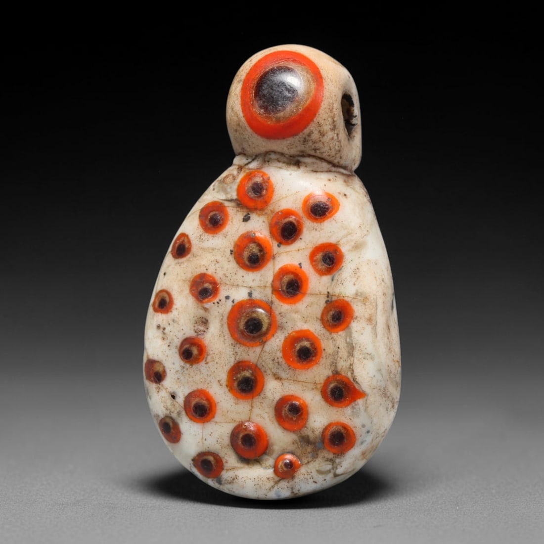 Ancient Medieval Islamic Eye Glass Pendant (c.8th-12th Century CE), 89EC: This wearable teardrop-shaped glass amulet originates from the early Islamic world, crafted to ward off malevolent influences using the powerful protective eye motif widely used across medieval Near E