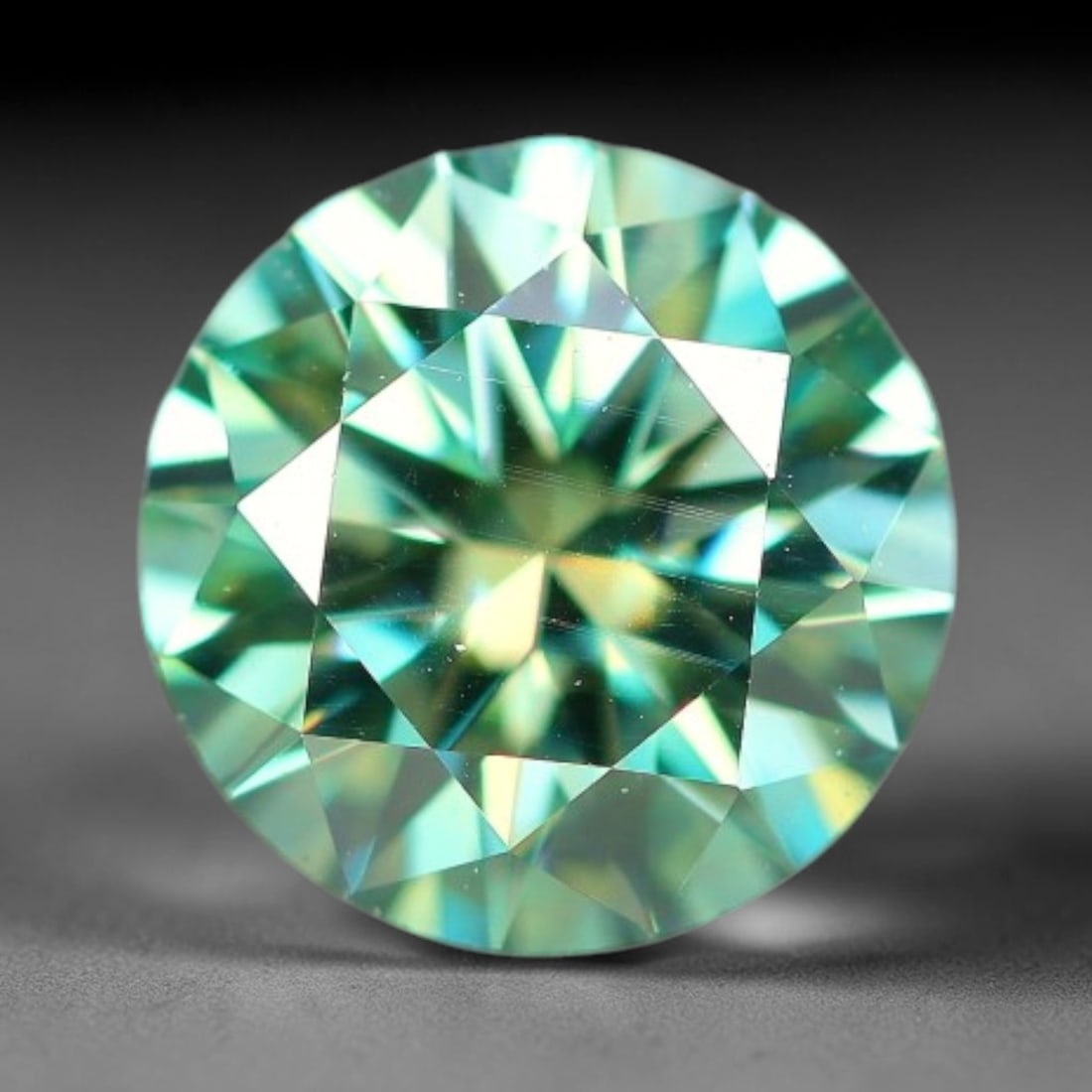 0.73 Carats Natural Teal Green Moissanite Loose Gemstone, 17FP: This lab-grown teal green moissanite measures 5.8x3.6mm, composed of silicon carbide with an outstanding refractive index that yields vivid, multi-hued sparkle in all lighting. Fine natural micro crys