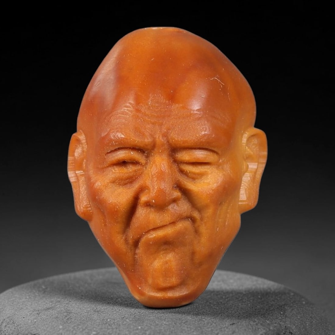 A Chinese Carved Natural Olive Nut Drilled Art Bead, 52BZ: Traditional craft bead carved from solid natural olive nut core, representing a classic miniature Chinese micro-carving folk art piece with a pre-drilled suspension bore integrated for easy threading 